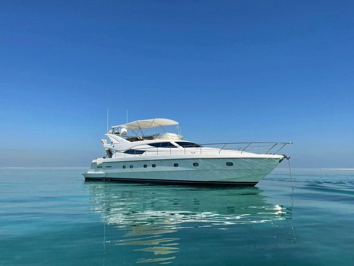 a white yacht in the water aboard 2002 FERRETTI 620 Yacht for Sale