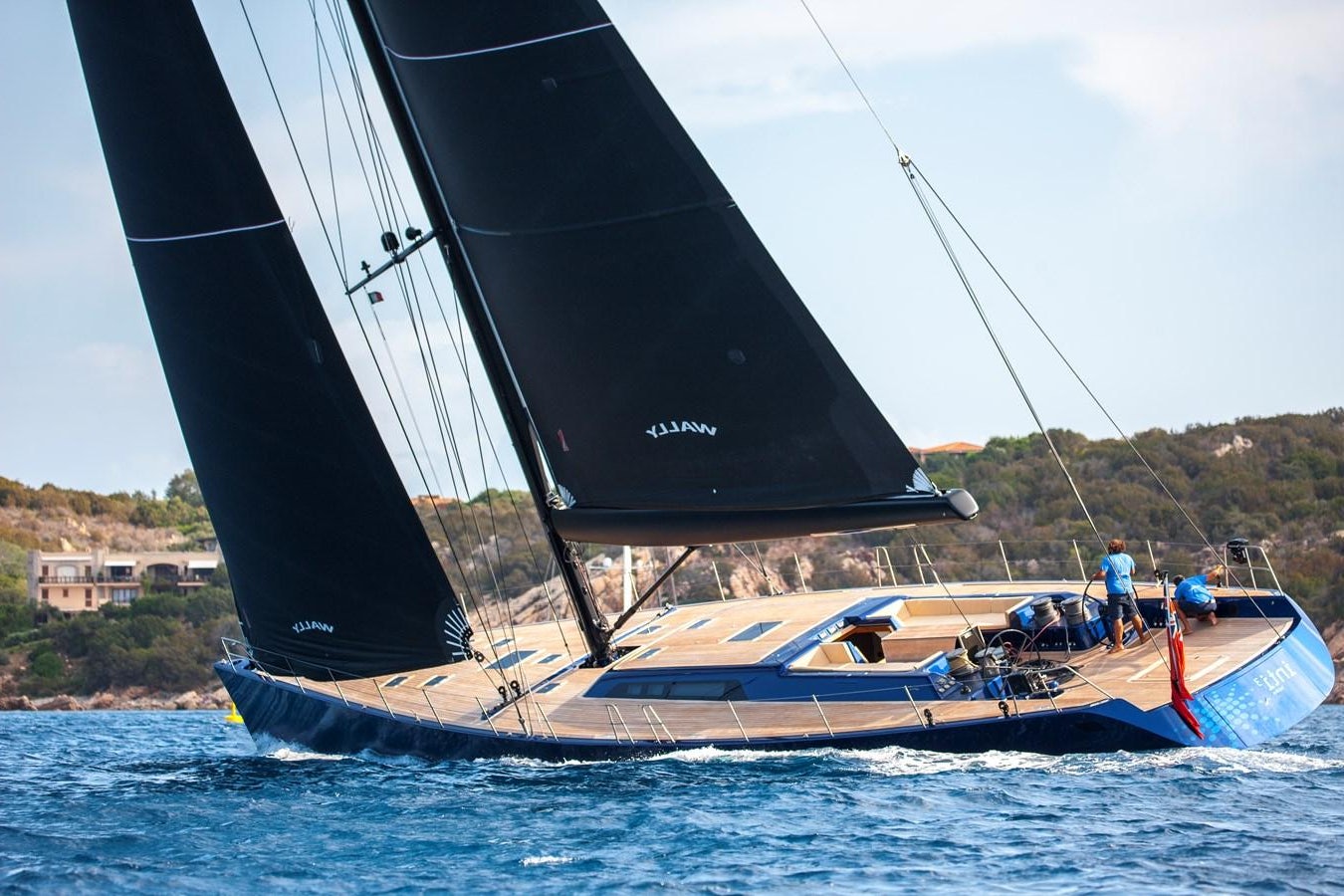 a sailboat with a large sail aboard INTI CUBE Yacht for Sale