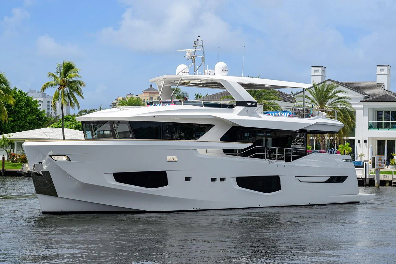 a white boat on the water aboard C3 Yacht for Sale