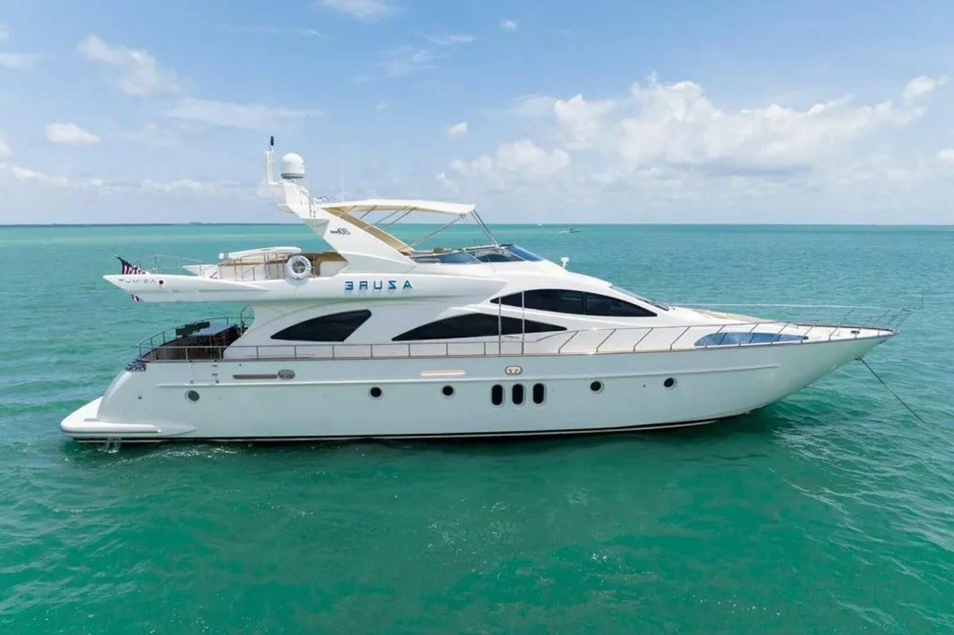 a white yacht in the water aboard AZURE Yacht for Sale