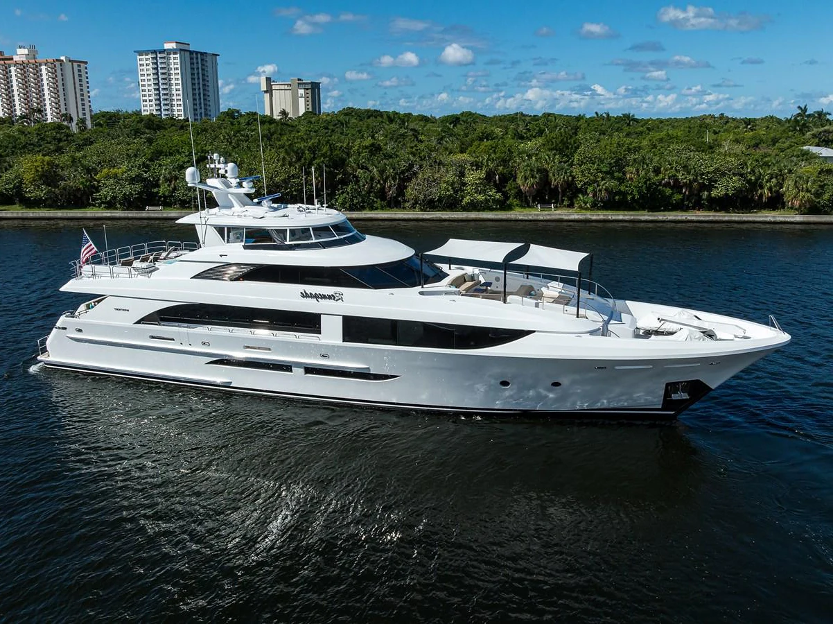 a white yacht on the water aboard RENNEGADE Yacht for Sale