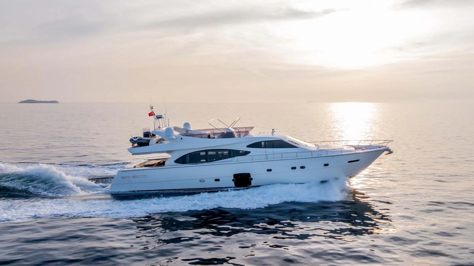 a white yacht in the water aboard STELLINA Yacht for Sale