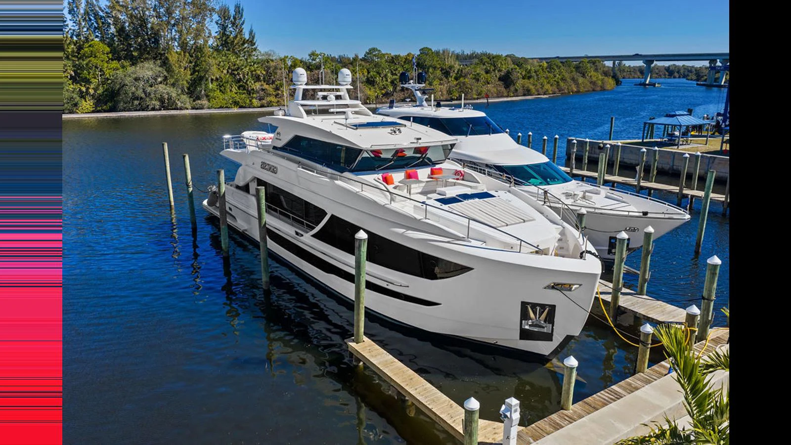 a group of boats are parked in a harbor aboard MOBILLITY Yacht for Sale