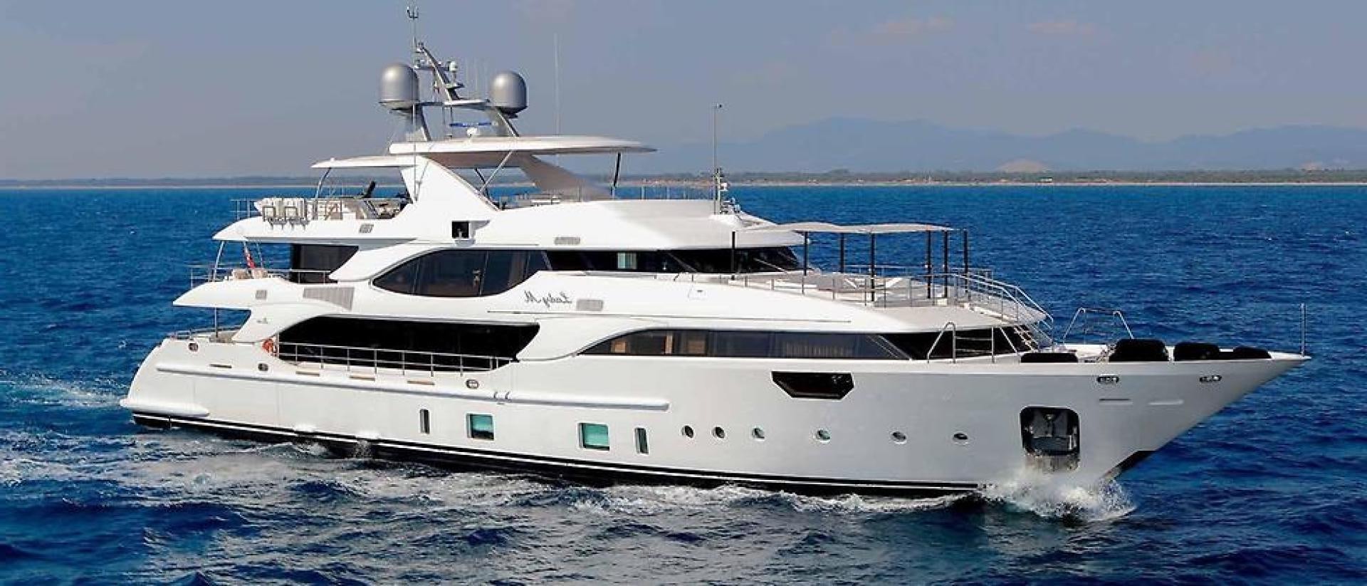 a white yacht on the water aboard DREW Yacht for Sale