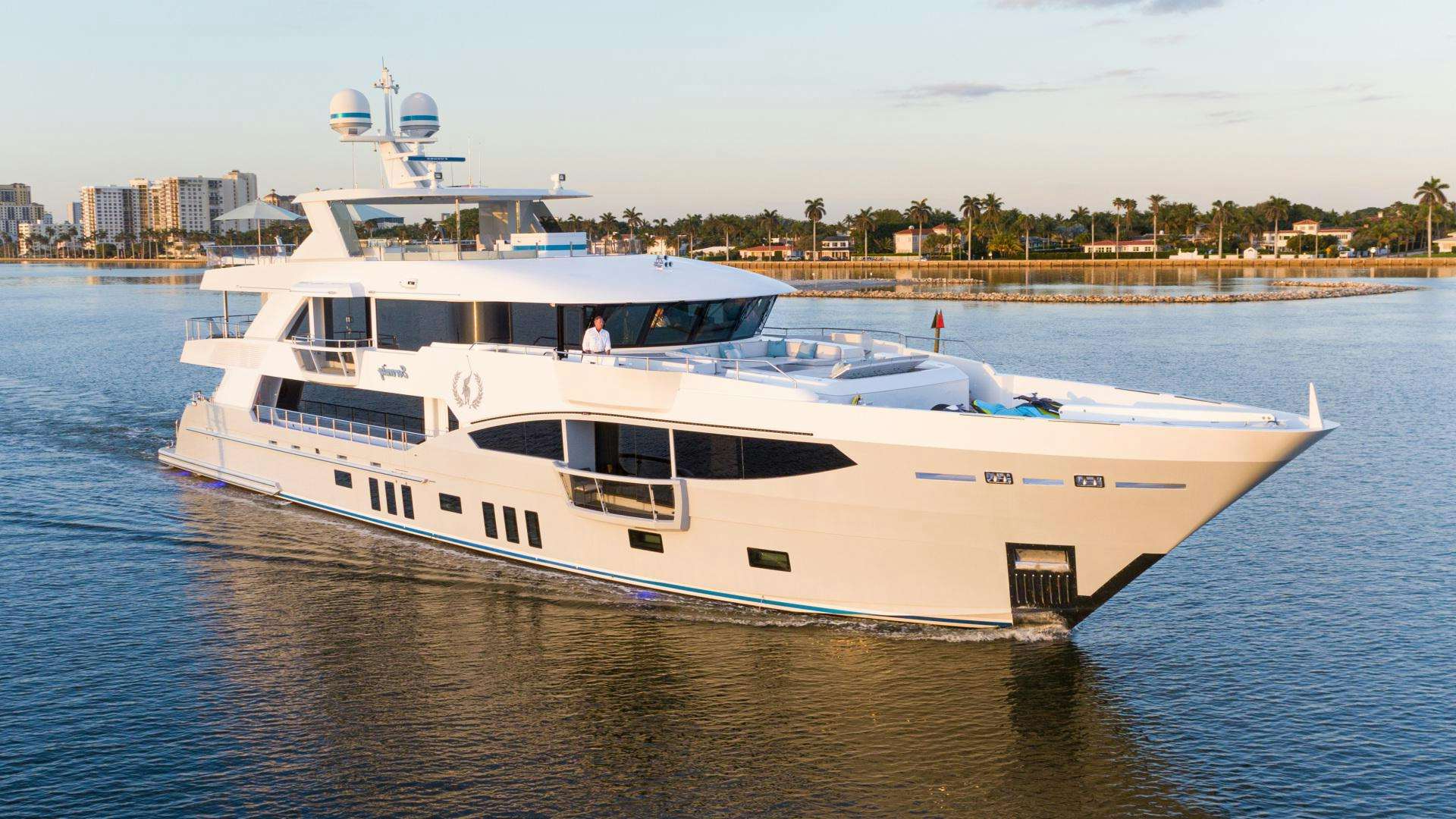 a white yacht on the water aboard SERENITY Yacht for Sale