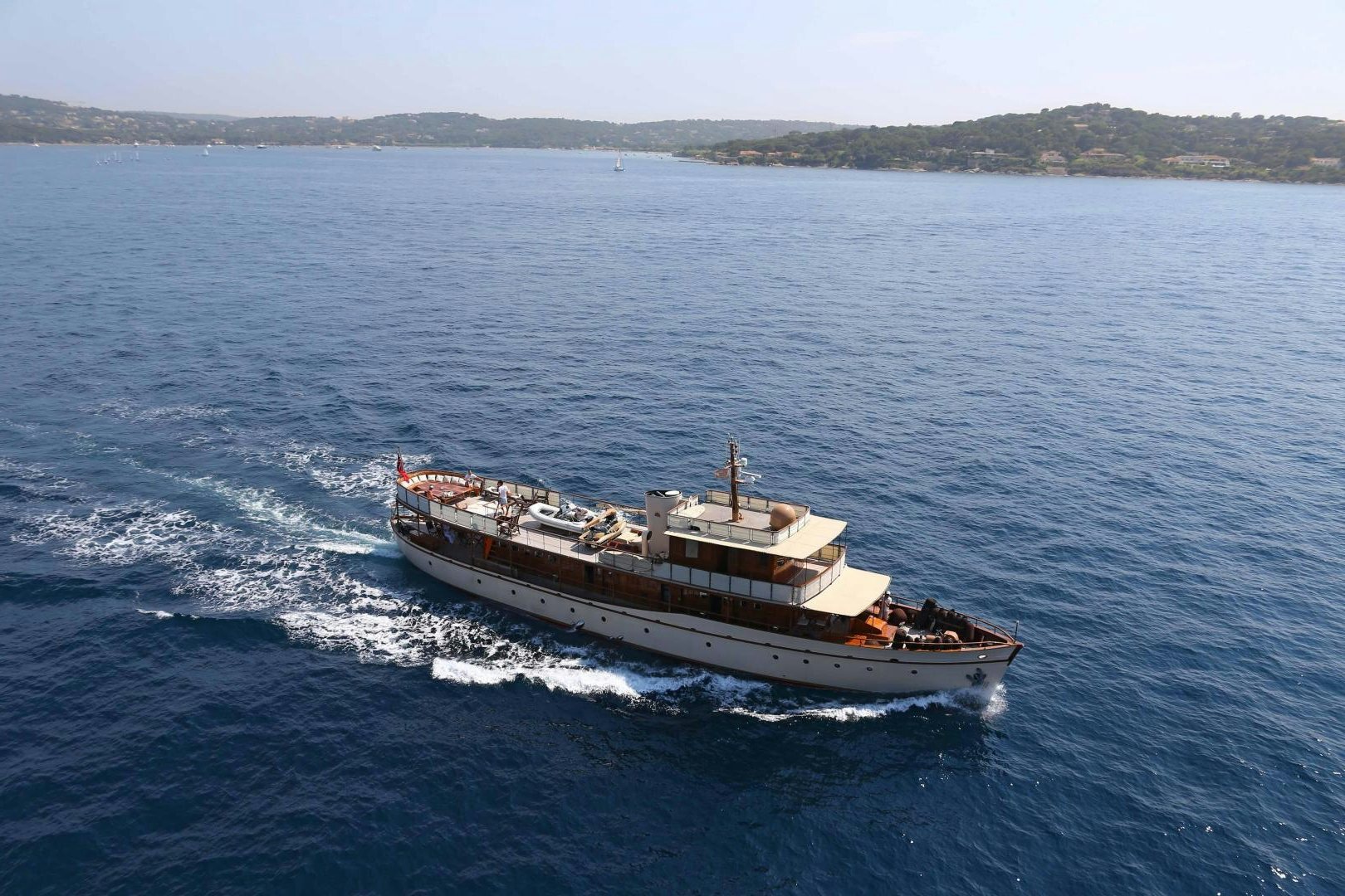 a ship on the water aboard OVER THE RAINBOW Yacht for Sale