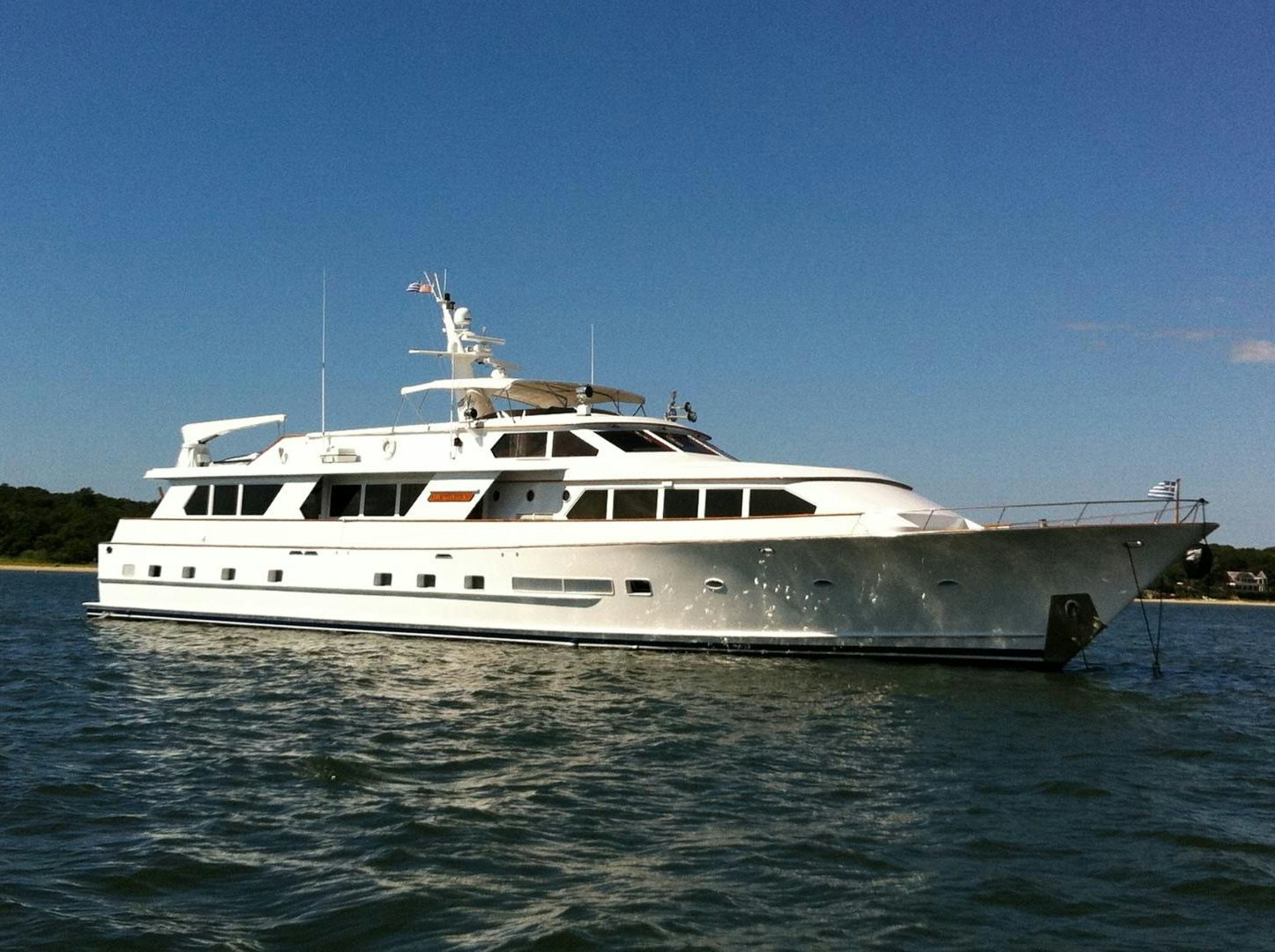 a white yacht on the water aboard ZANTINO III Yacht for Sale