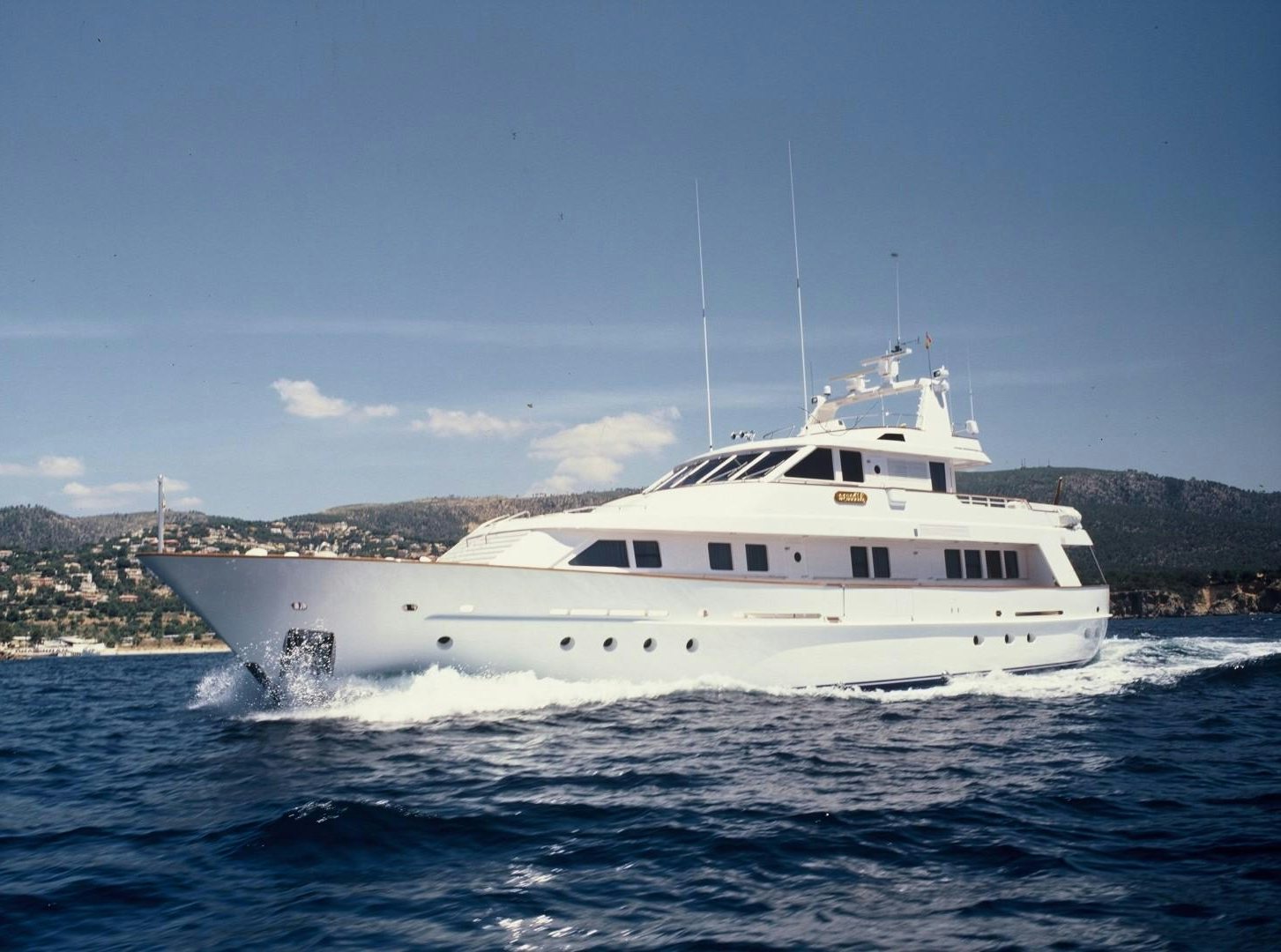 a white boat on the water aboard NO NAME Yacht for Sale