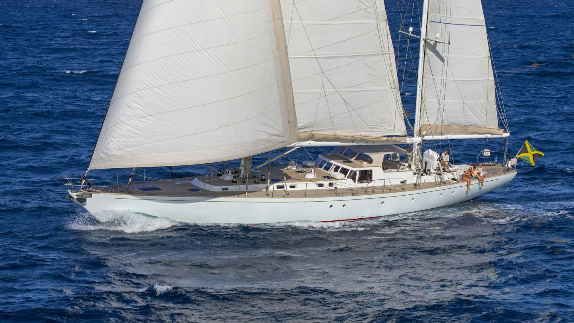 a white sailboat on the water aboard JUPITER Yacht for Sale
