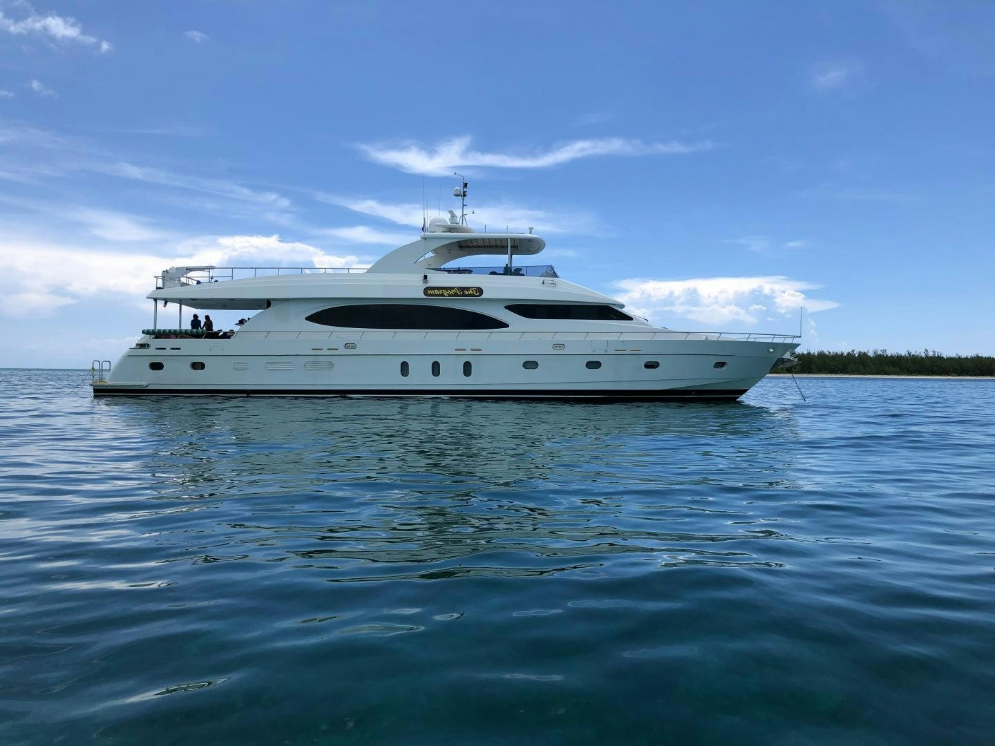 a white yacht in the water aboard ANDIAMO Yacht for Sale