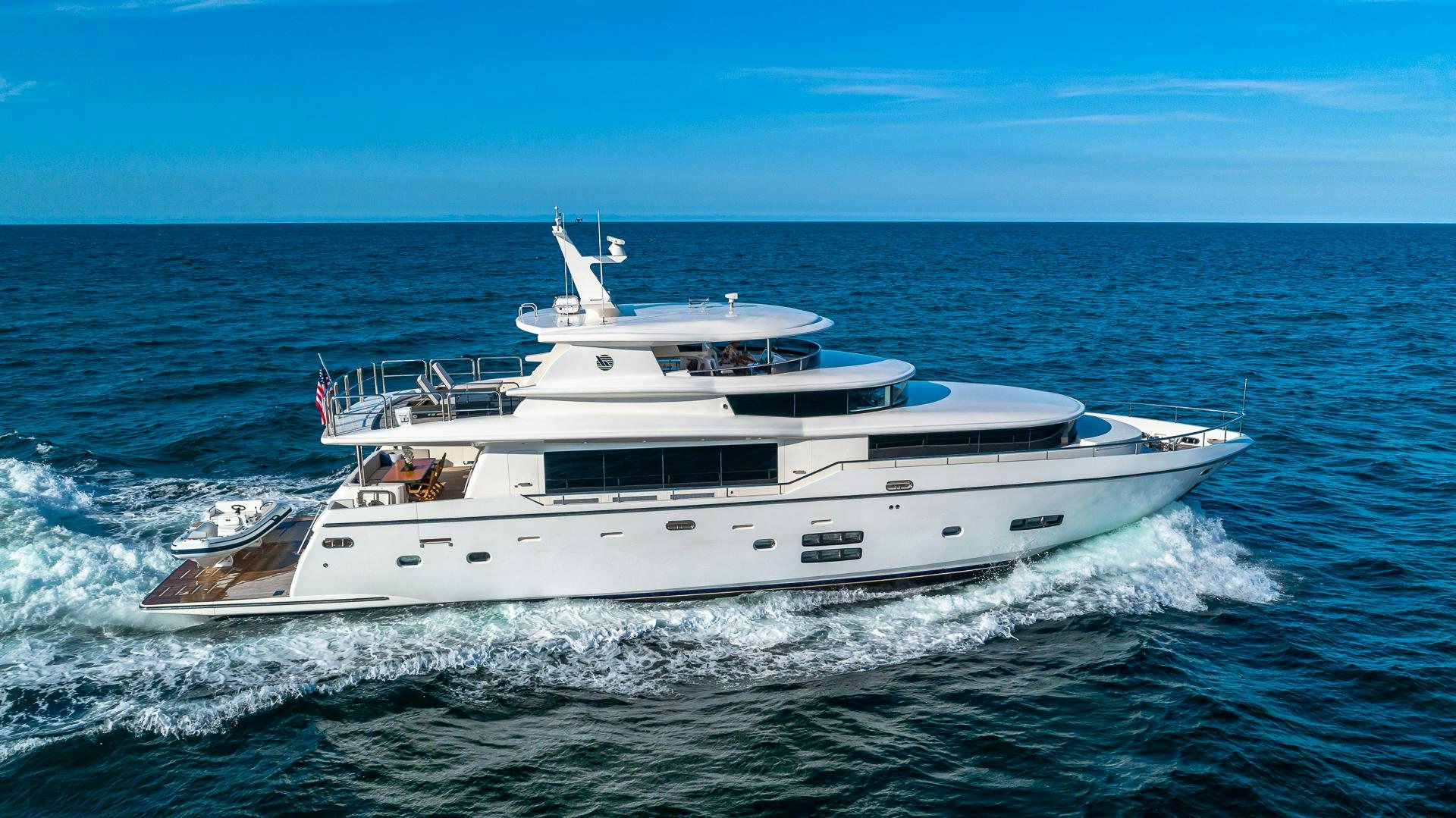 a white yacht on the water aboard LIFE FOR SALE Yacht for Sale