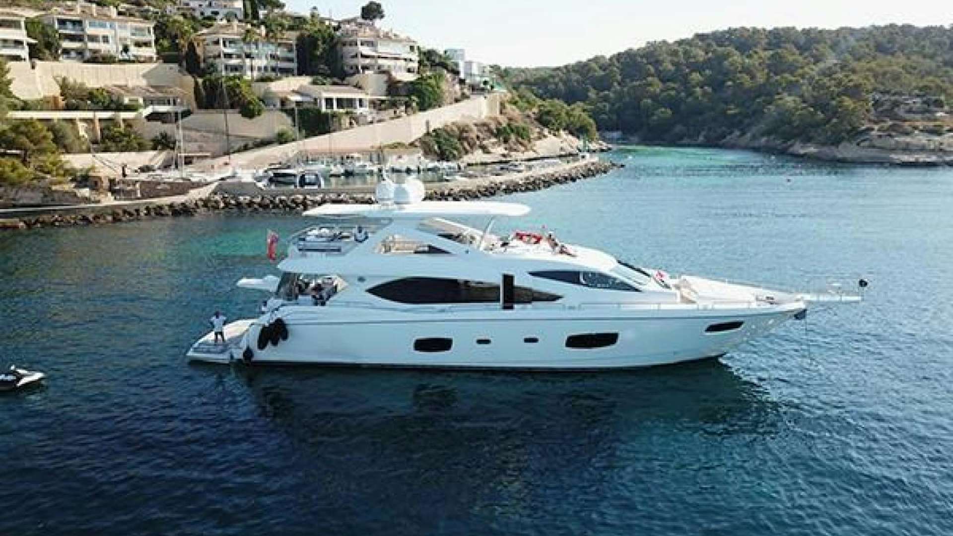 a boat in the water aboard EXIMIUS Yacht for Sale