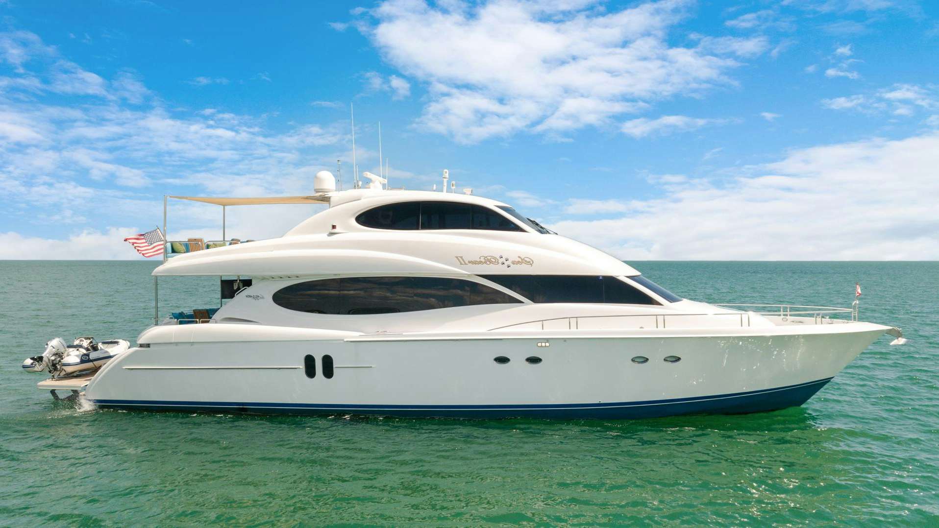 a white yacht in the water aboard BAMBOOZLED AGAIN Yacht for Sale