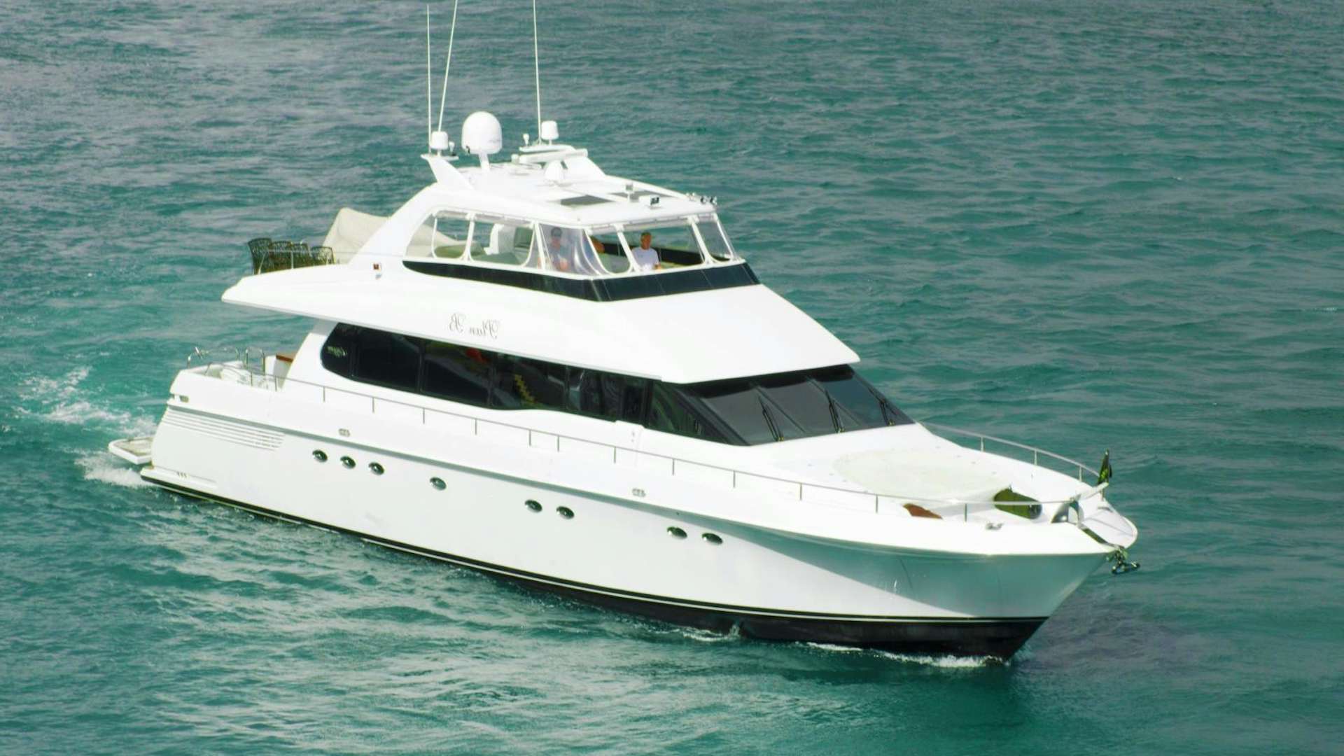 a white yacht in the water aboard PLAN B Yacht for Sale