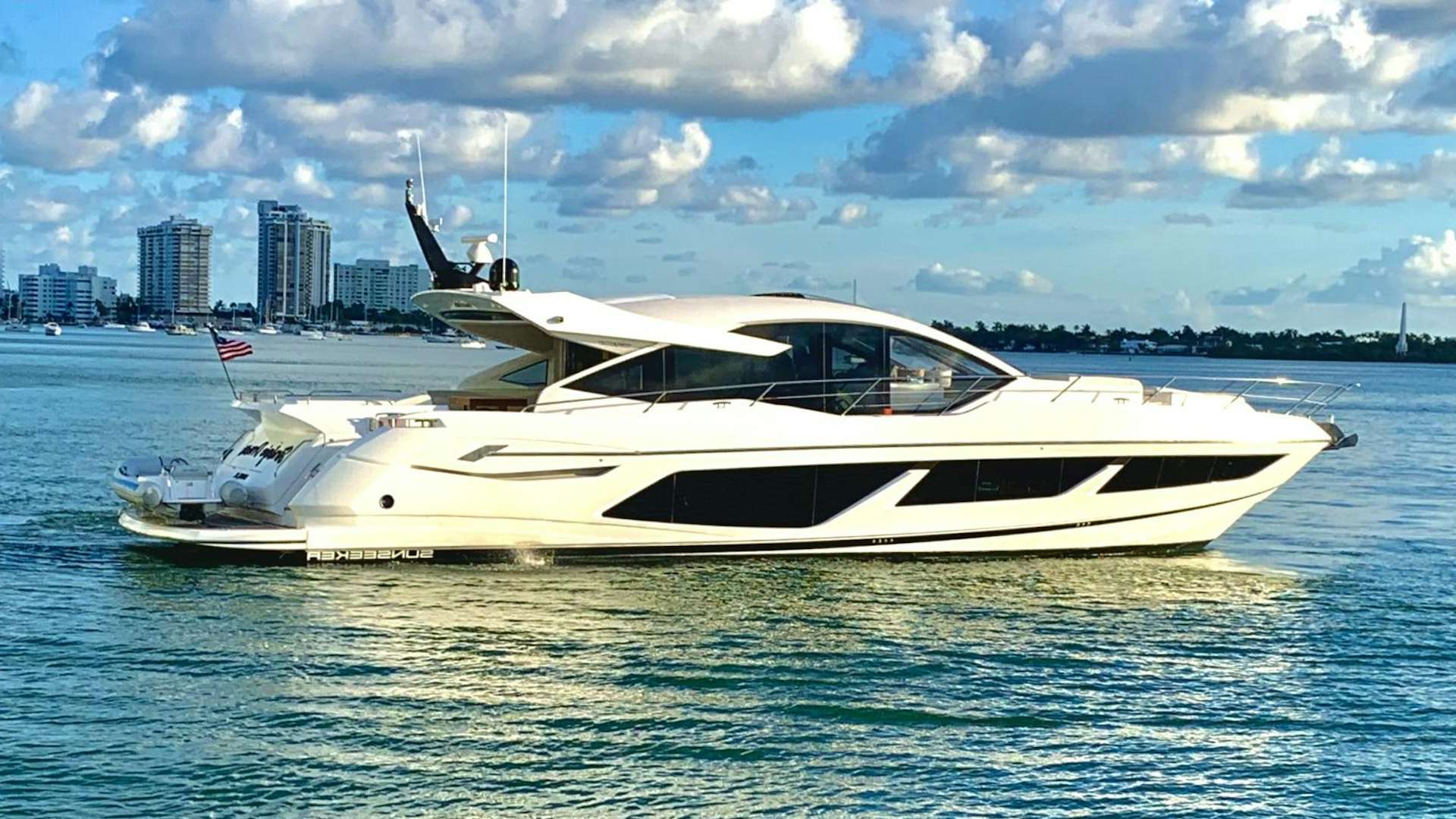 a white yacht in the water aboard STRATEGIC DREAMS Yacht for Sale