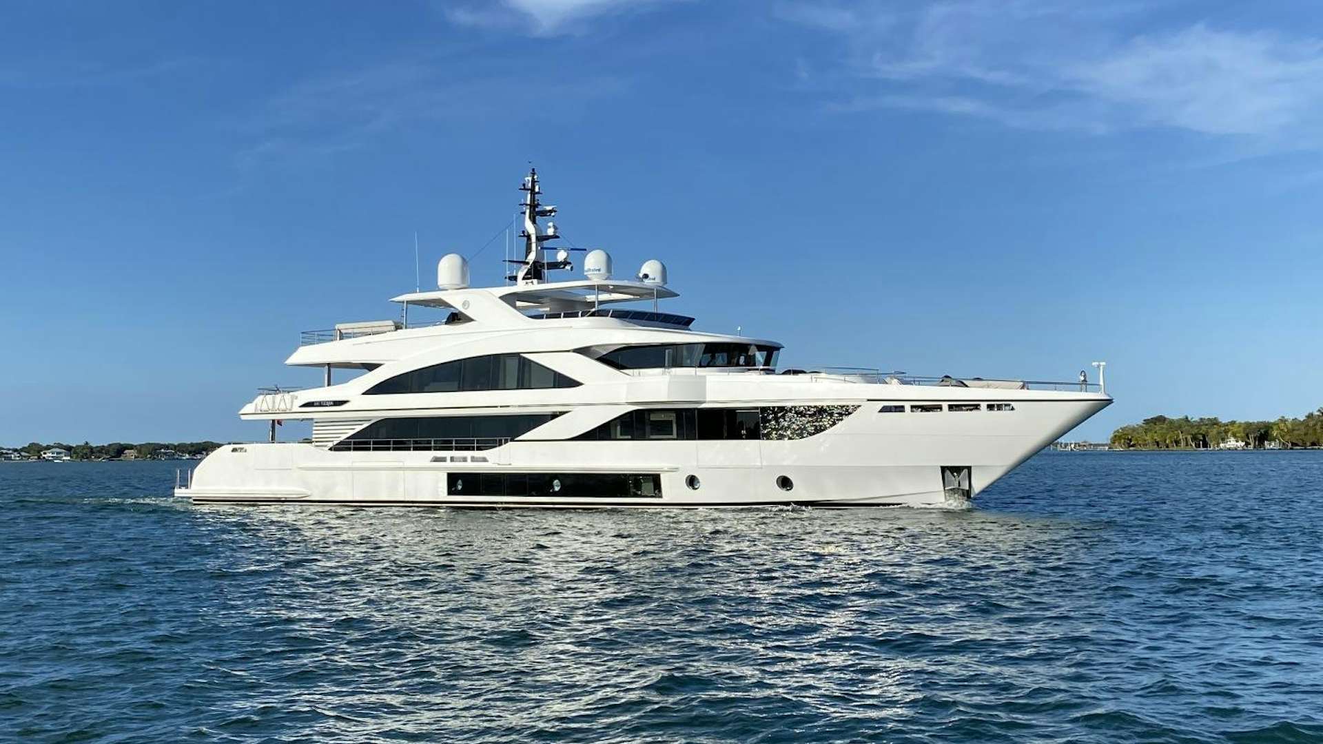 a white yacht on the water aboard MAJESTY 140 #5 Yacht for Sale