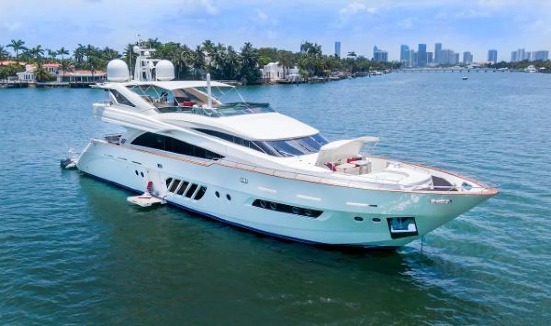 a white yacht on the water aboard CASUAL Yacht for Sale
