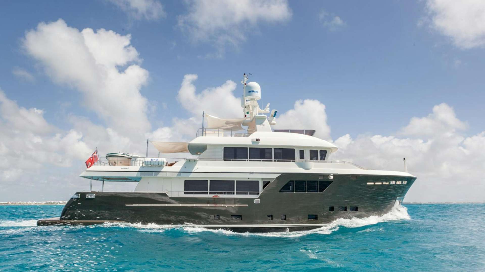 a large boat on the water aboard ACALA Yacht for Sale
