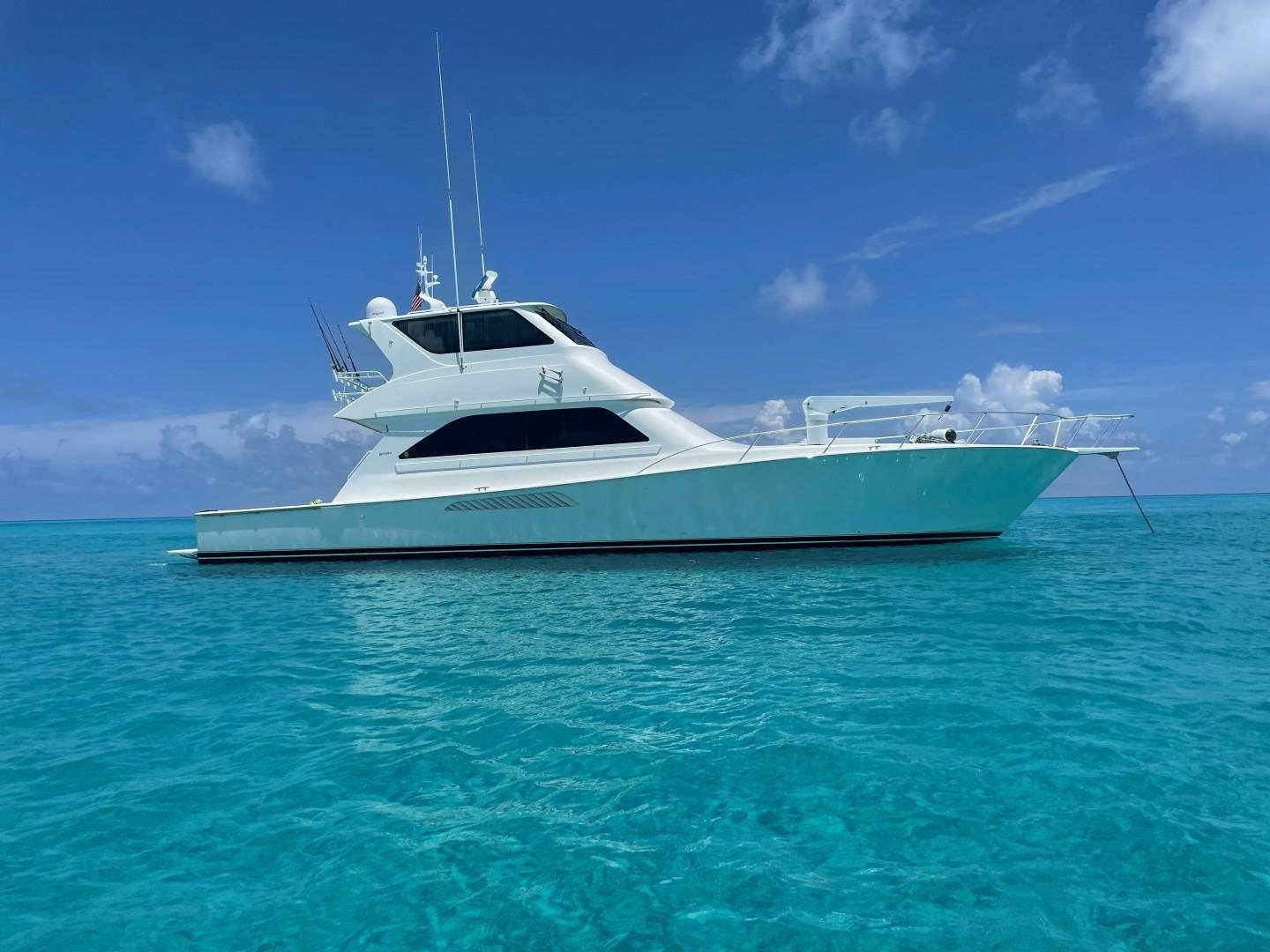 a white boat in the water aboard King & I Yacht for Sale