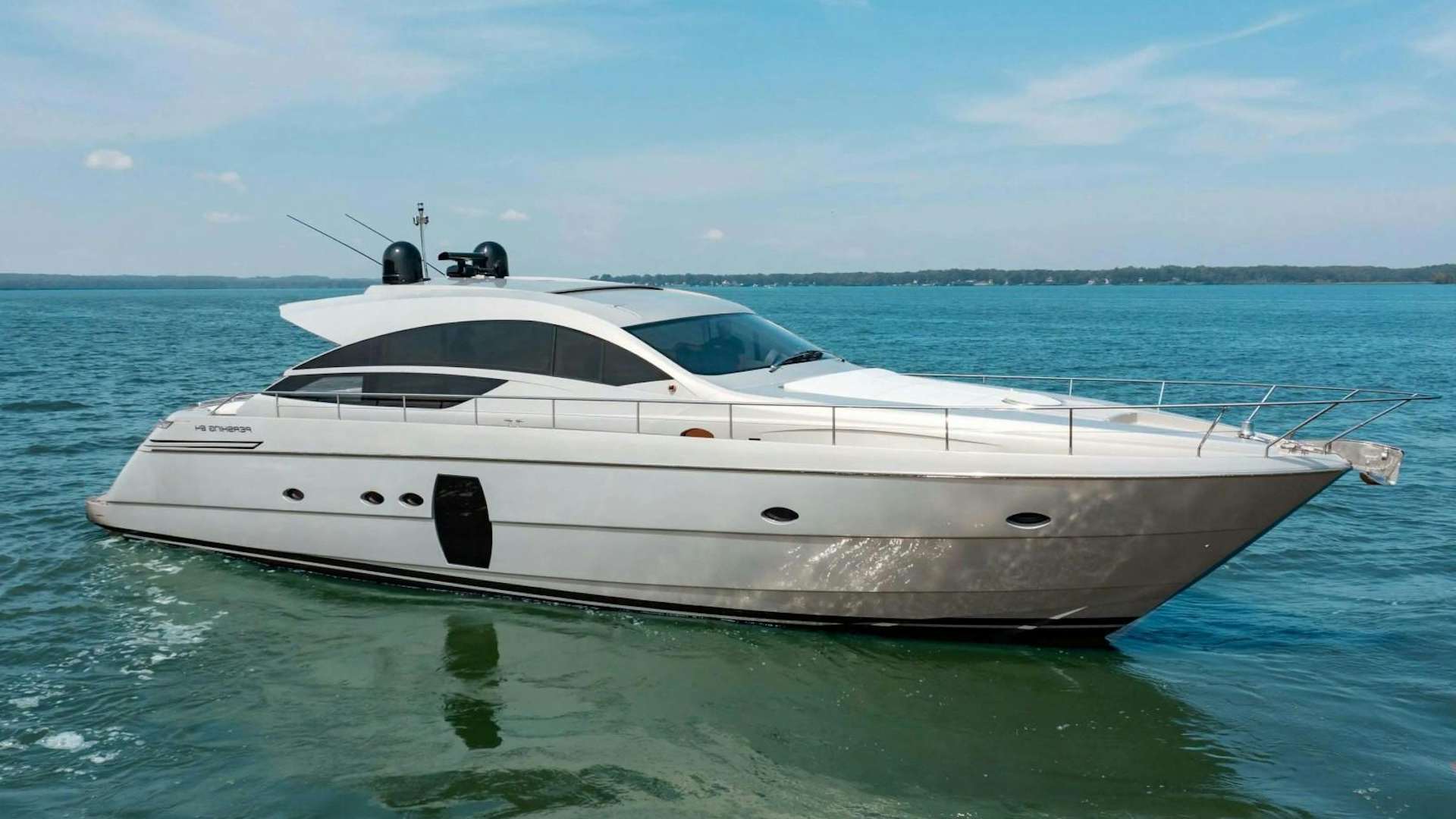a white boat in the water aboard SAPHIA Yacht for Sale
