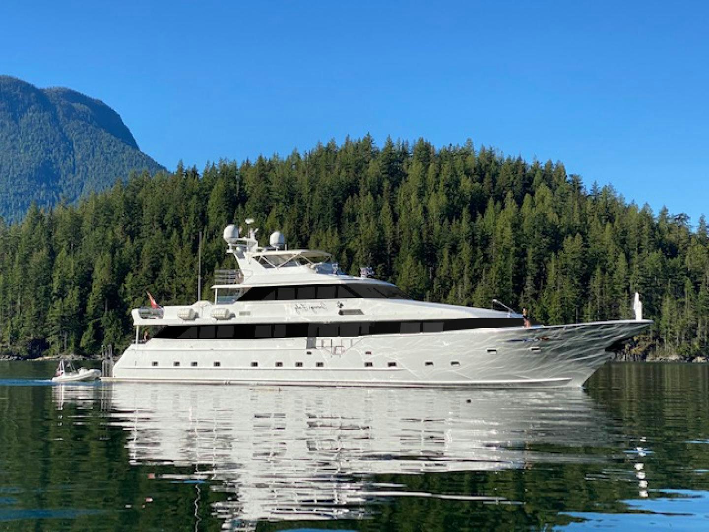 a large boat on the water aboard SOVEREIGN LADY Yacht for Sale