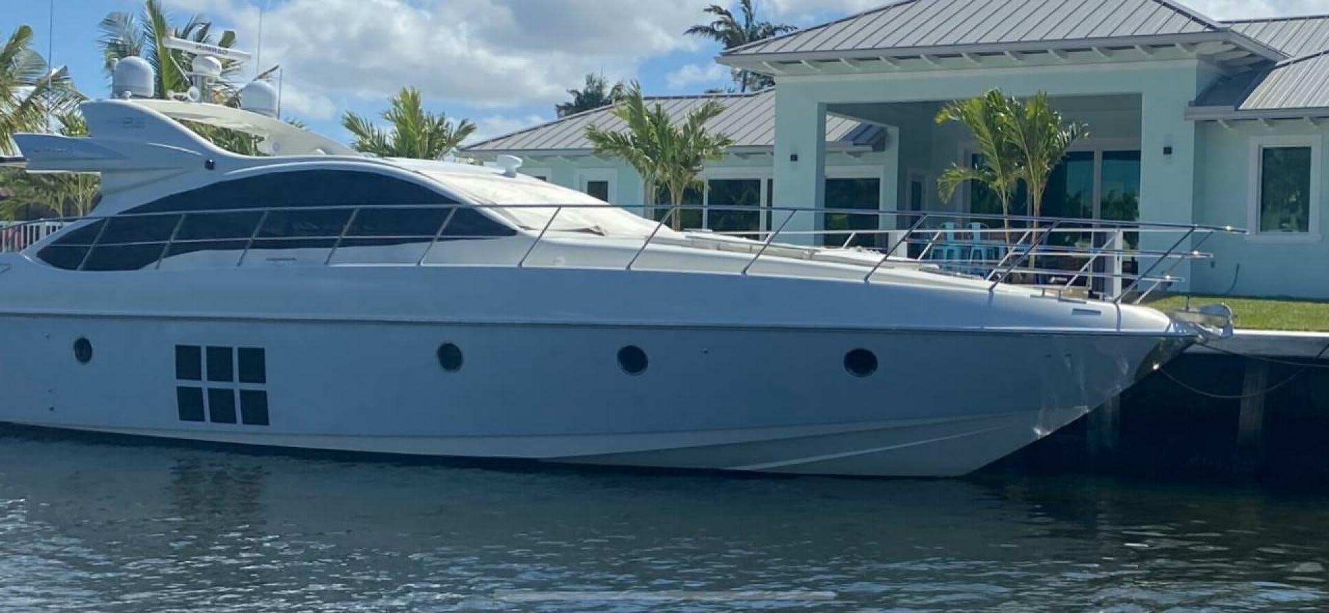 a white yacht in the water aboard DV8 Yacht for Sale