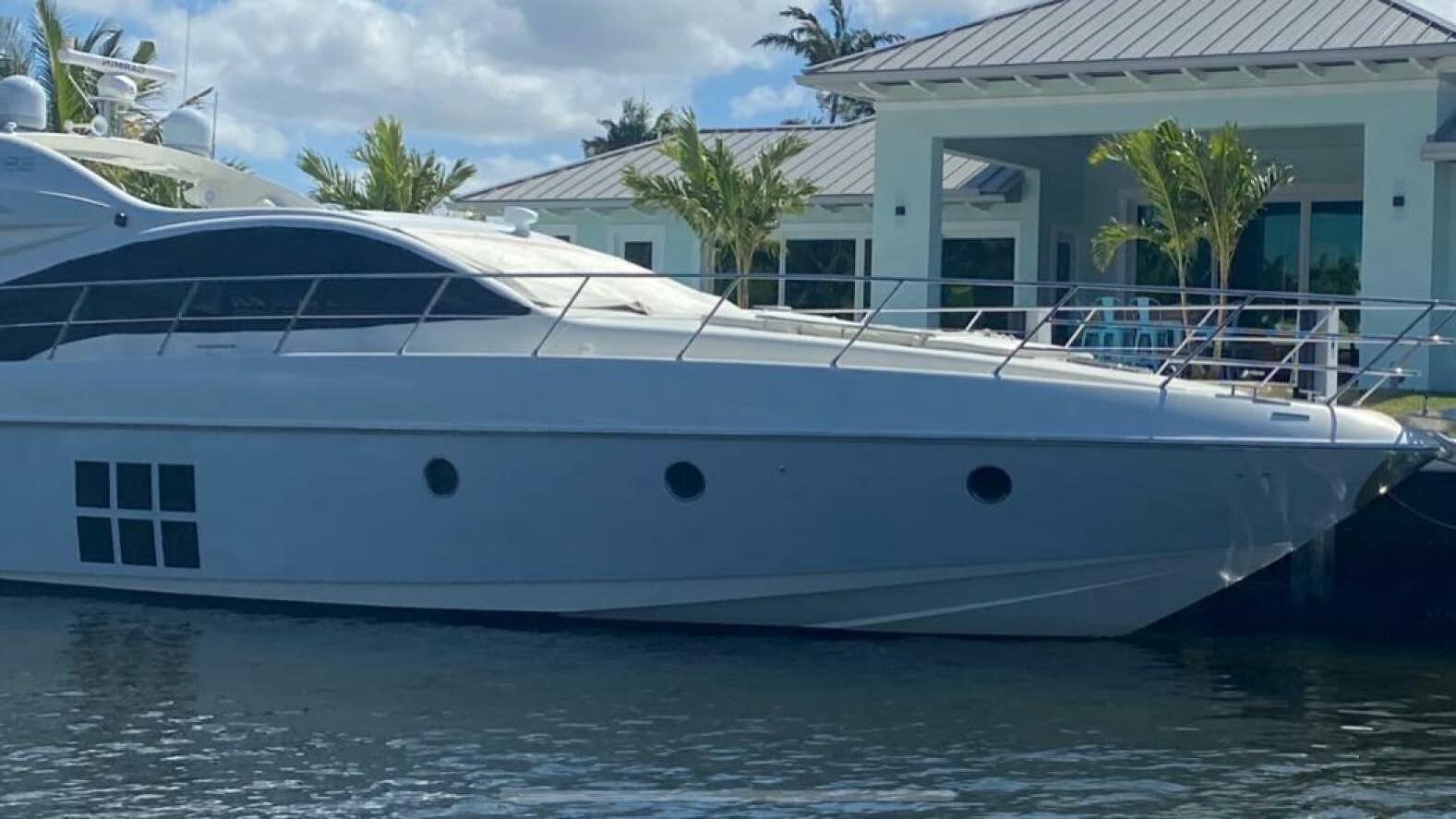 a white yacht in the water aboard DV8 Yacht for Sale