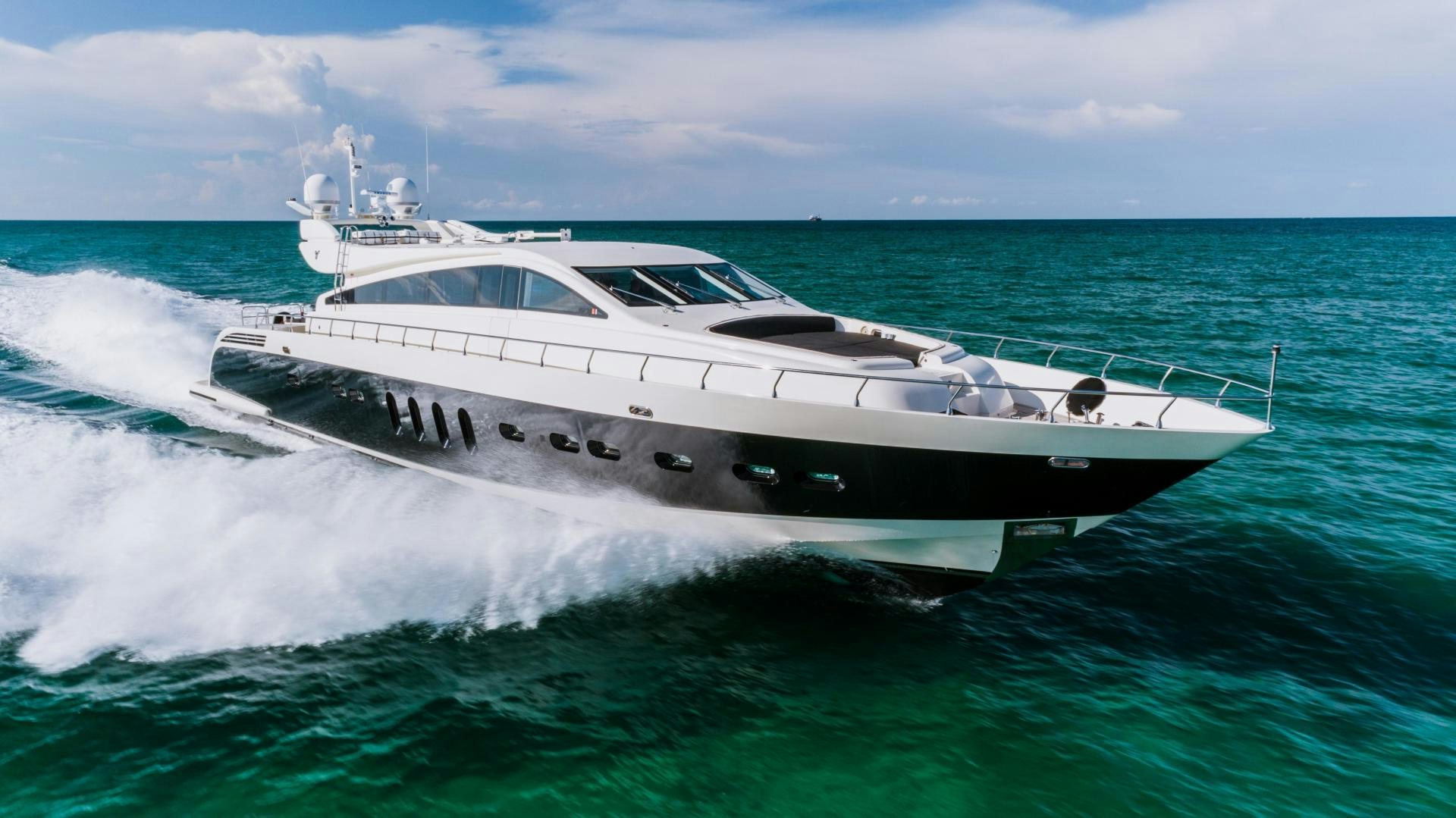 a white yacht on the water aboard CASSINELLA Yacht for Sale