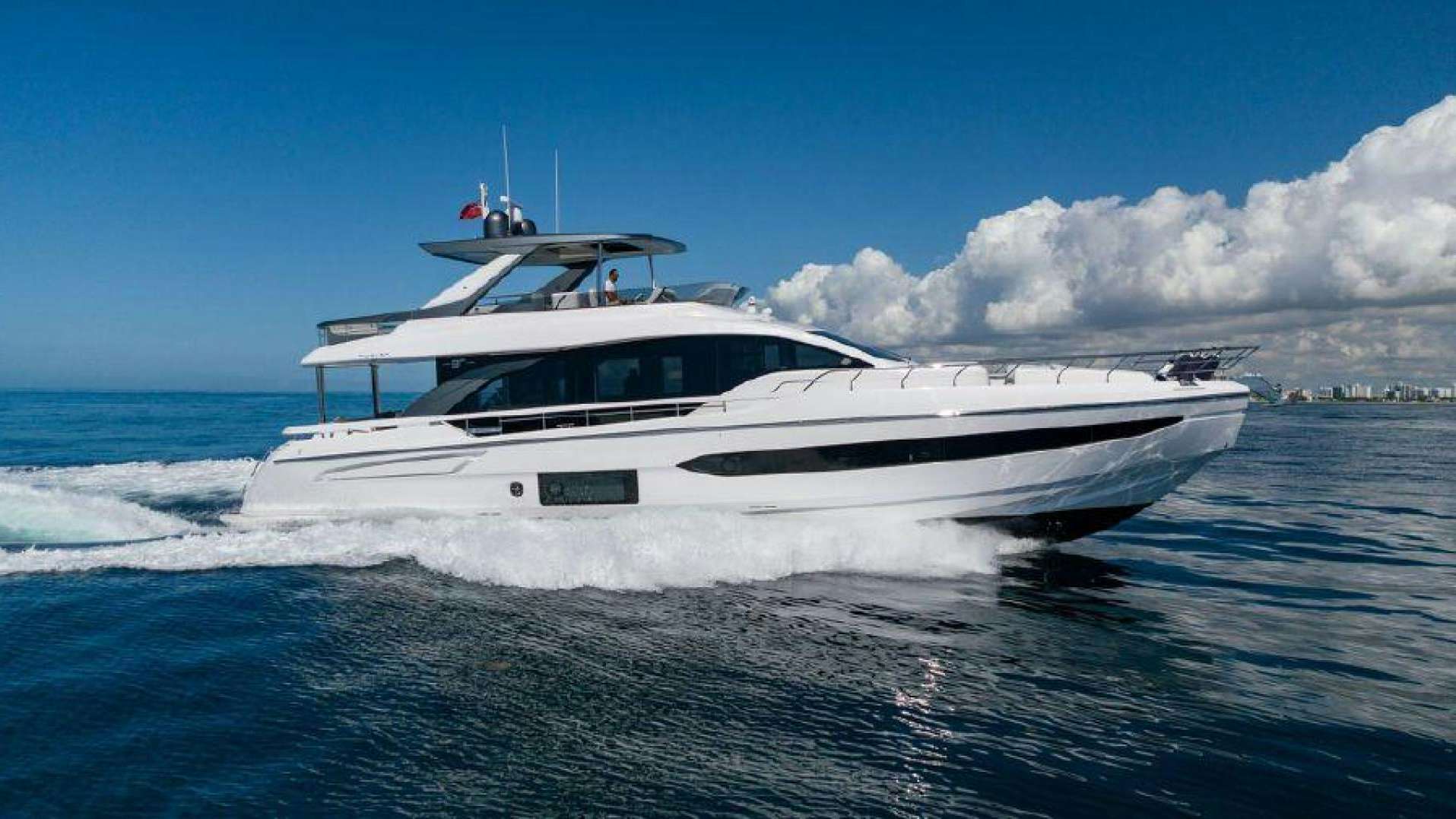 a white yacht in the water aboard SUN LIFE Yacht for Sale