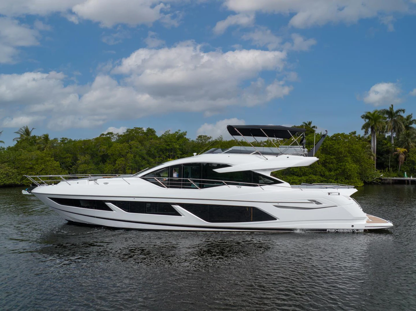 a boat on the water aboard DEALER DEMO Yacht for Sale