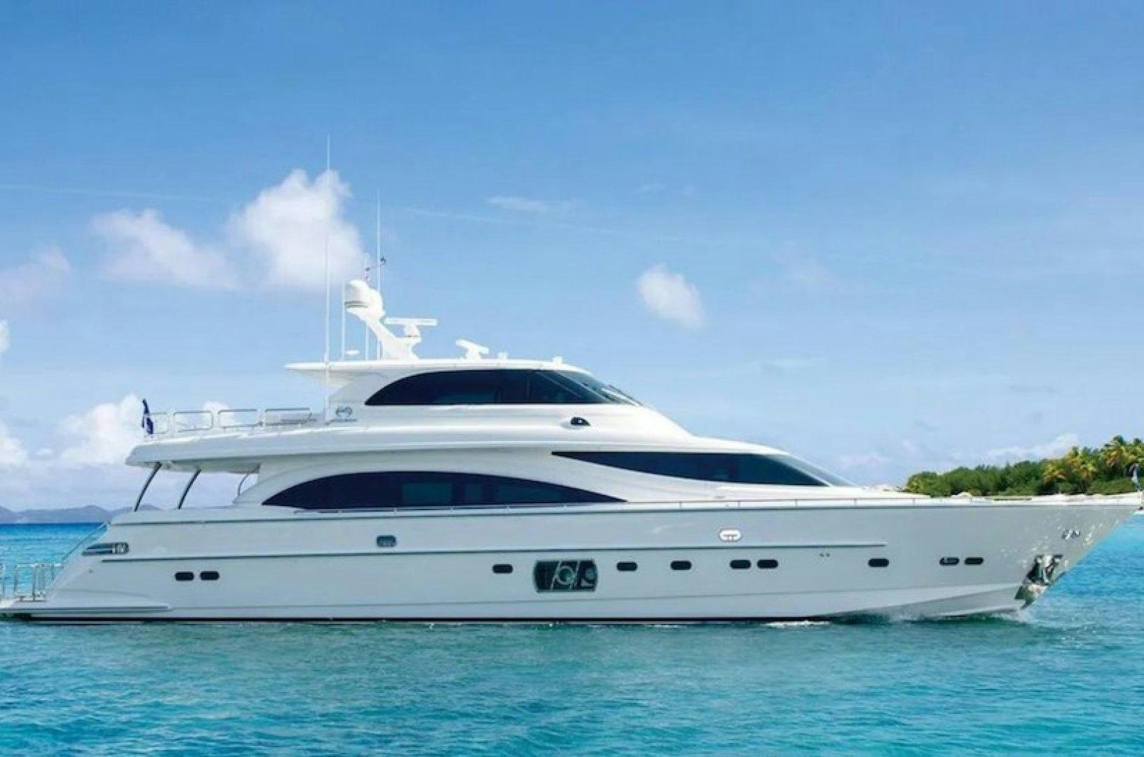a white yacht in the water aboard ENCORE Yacht for Sale