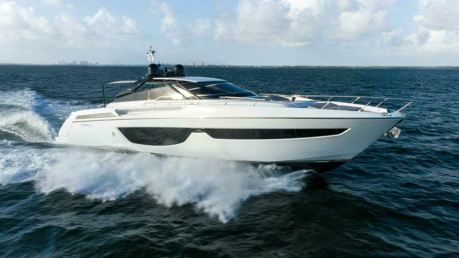 a white yacht on the water aboard 2QUICK Yacht for Sale