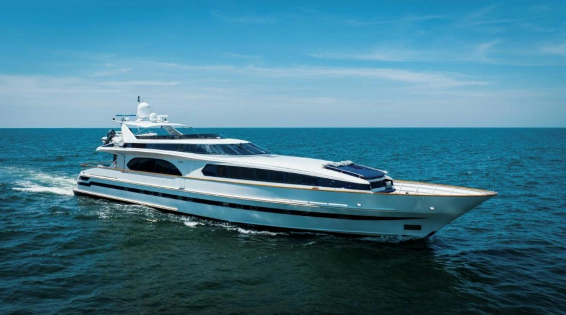 a white yacht in the water aboard CAPRICE Yacht for Sale