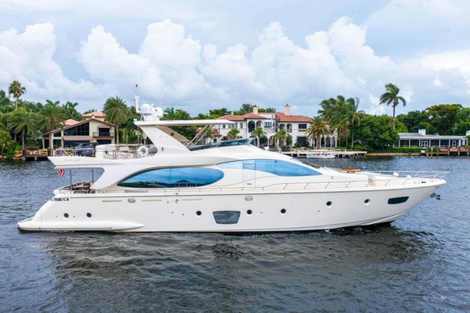 a white yacht in the water aboard KNOT BROKE Yacht for Sale