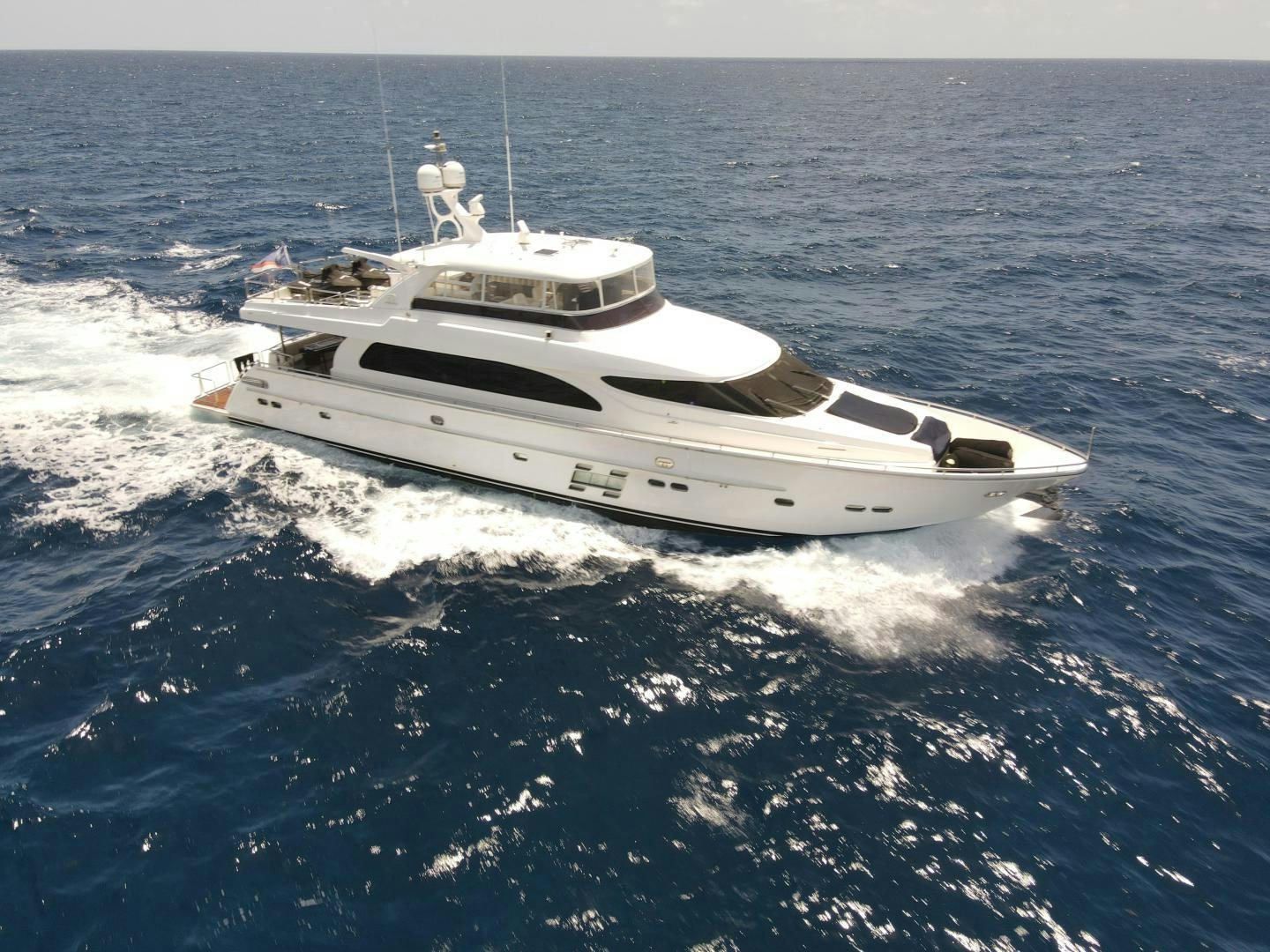 a white yacht on the water aboard AQUA LIFE Yacht for Sale