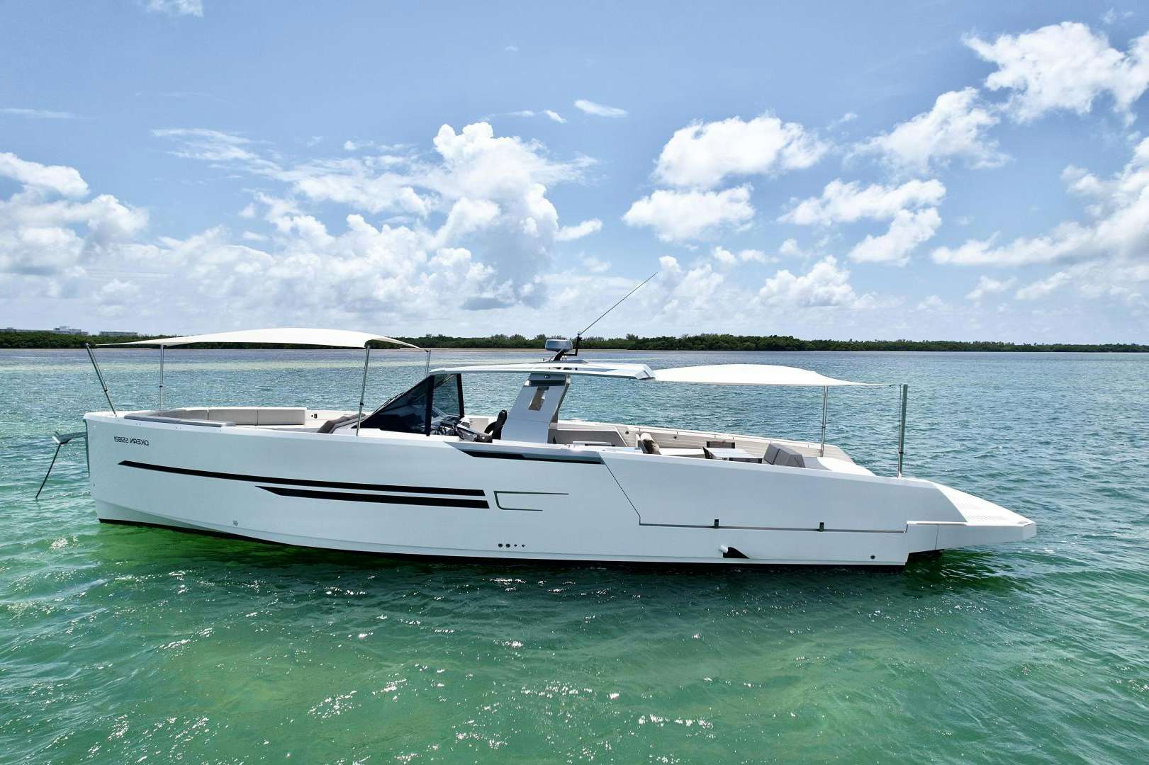 a white boat in the water aboard MECAE Yacht for Sale