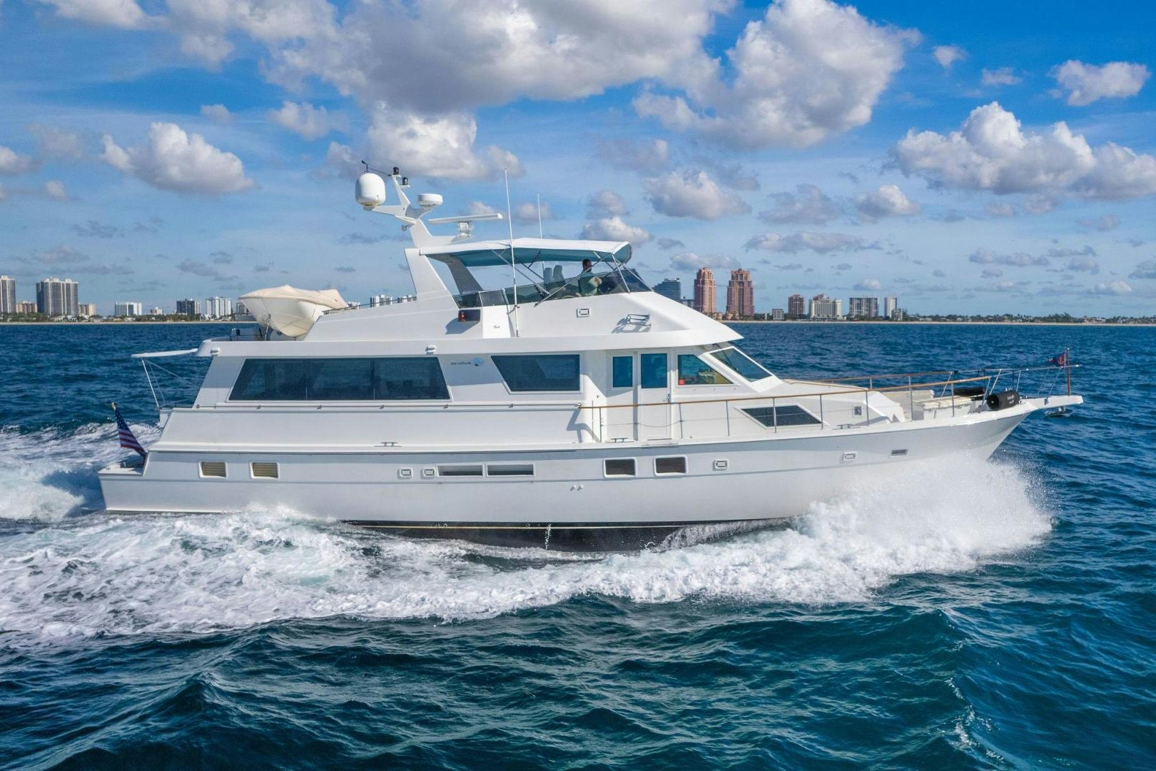 a white yacht on the water aboard PEYTONS PLACE Yacht for Sale