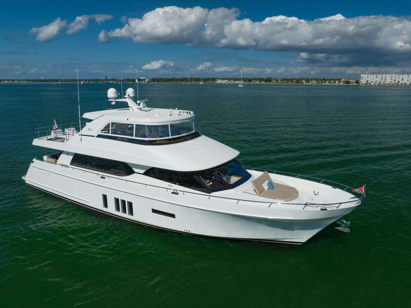 a white boat in the water aboard SEA NOTE Yacht for Sale