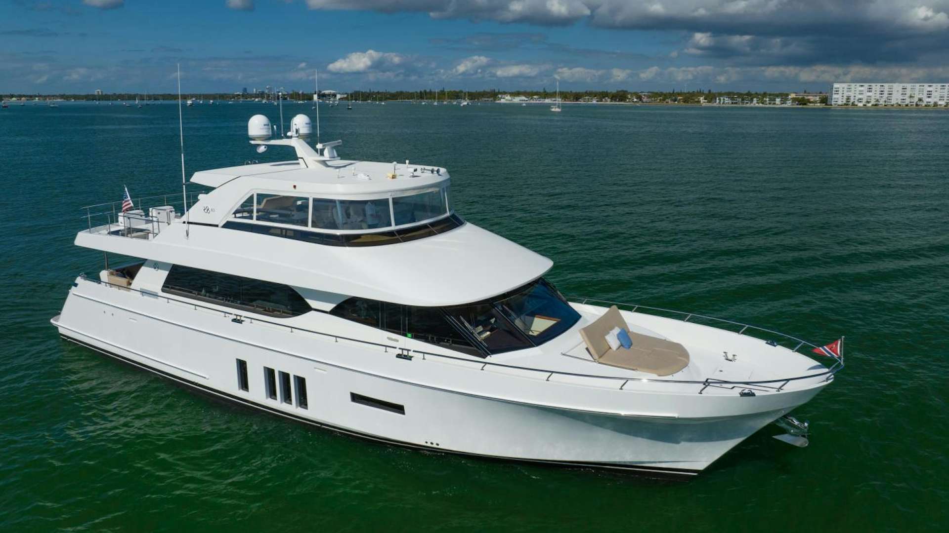 a white boat in the water aboard SEA NOTE Yacht for Sale