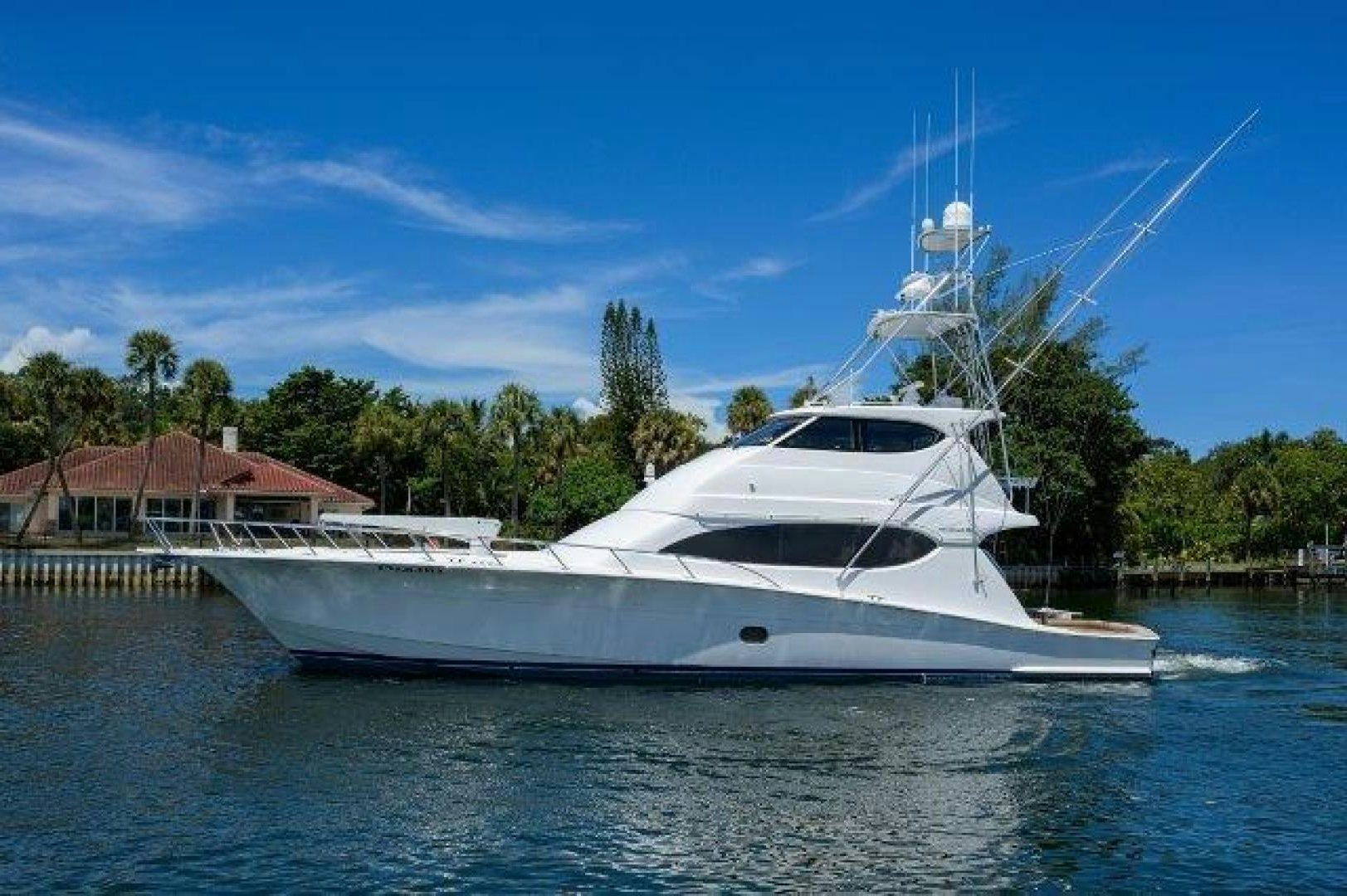 a white yacht on the water aboard THERAPY Yacht for Sale