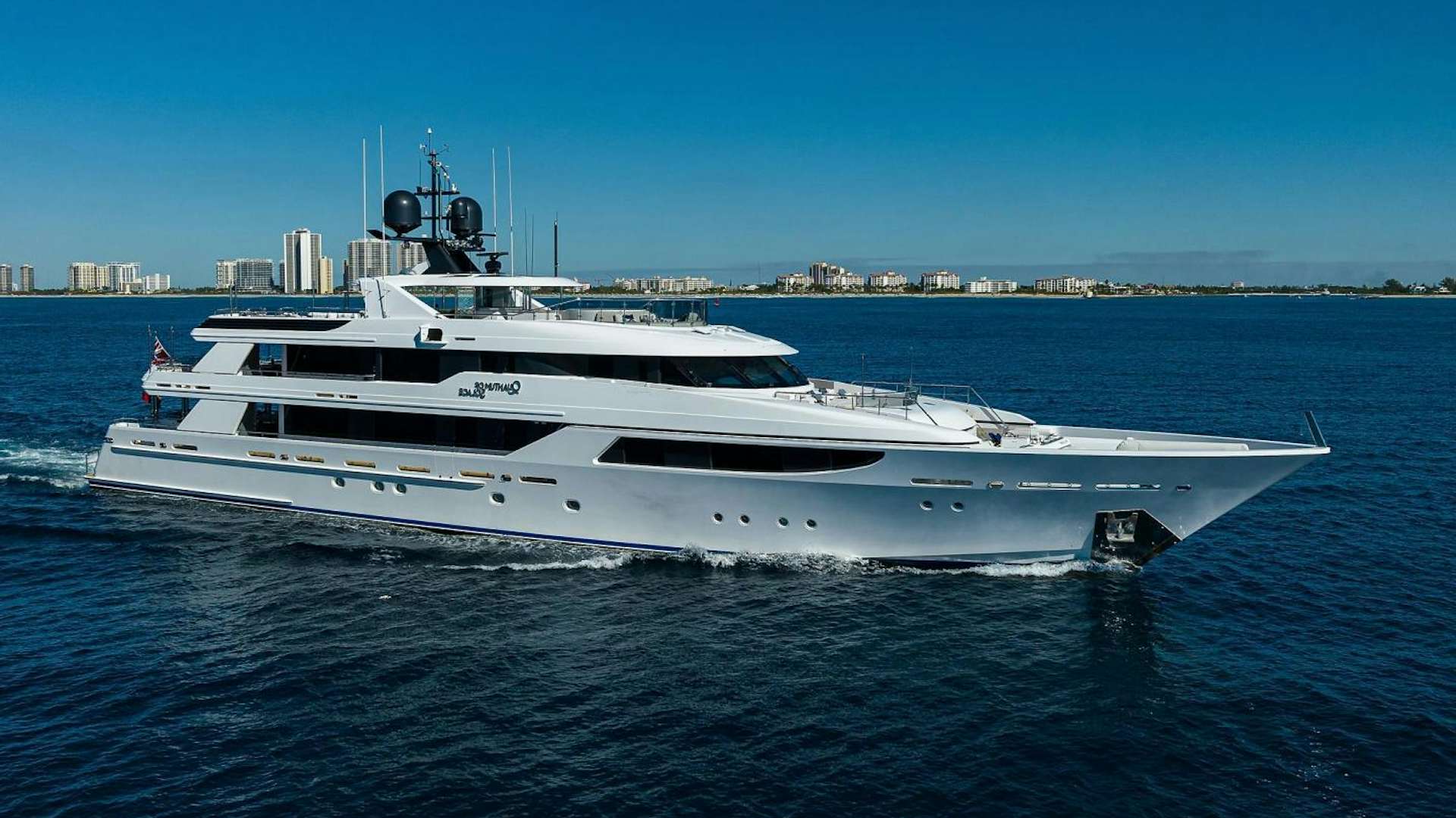 a white yacht on the water aboard QUANTUM OF SOLACE Yacht for Sale
