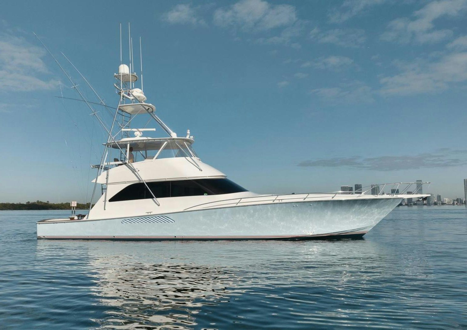 a white boat on the water aboard 68 VIKING Yacht for Sale