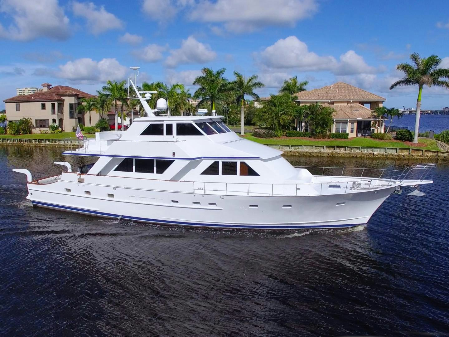a white boat on the water aboard PENDANA Yacht for Sale