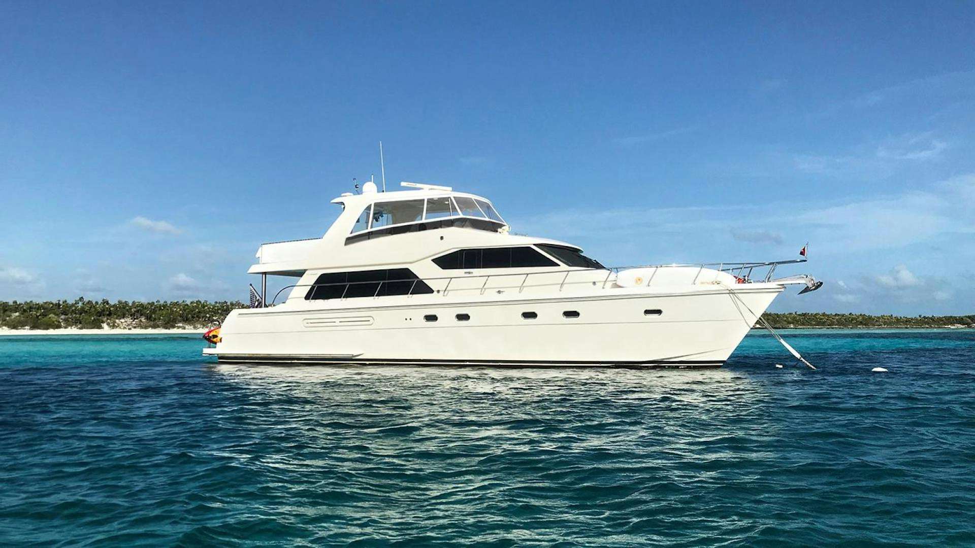 a white yacht in the water aboard FULL DECK Yacht for Sale