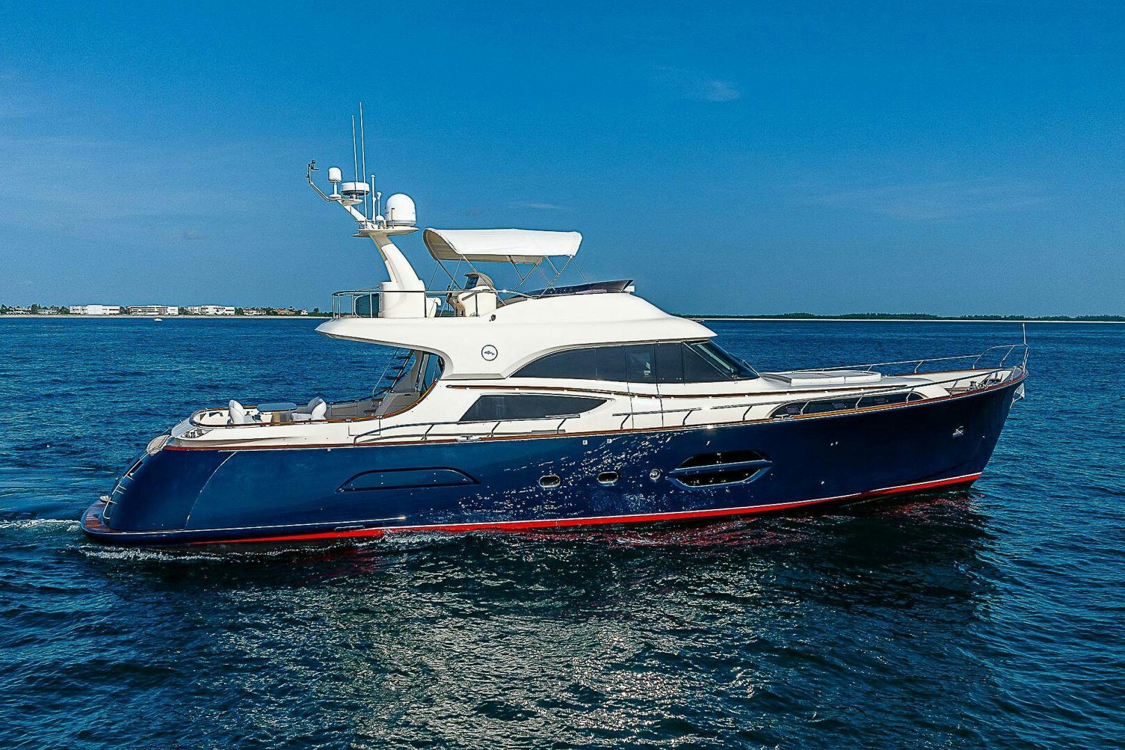 a large boat in the water aboard KNOT NANNY'S Yacht for Sale