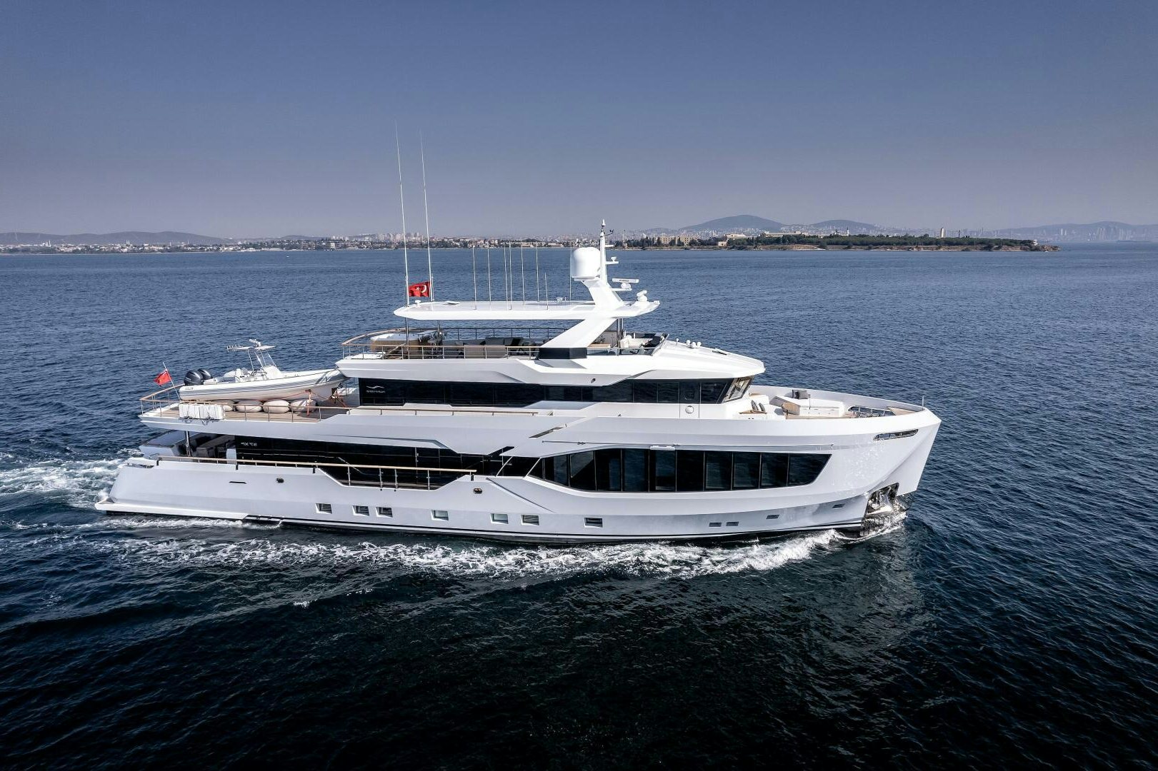a white yacht on the water aboard 37XP 08 ROCKIT Yacht for Sale