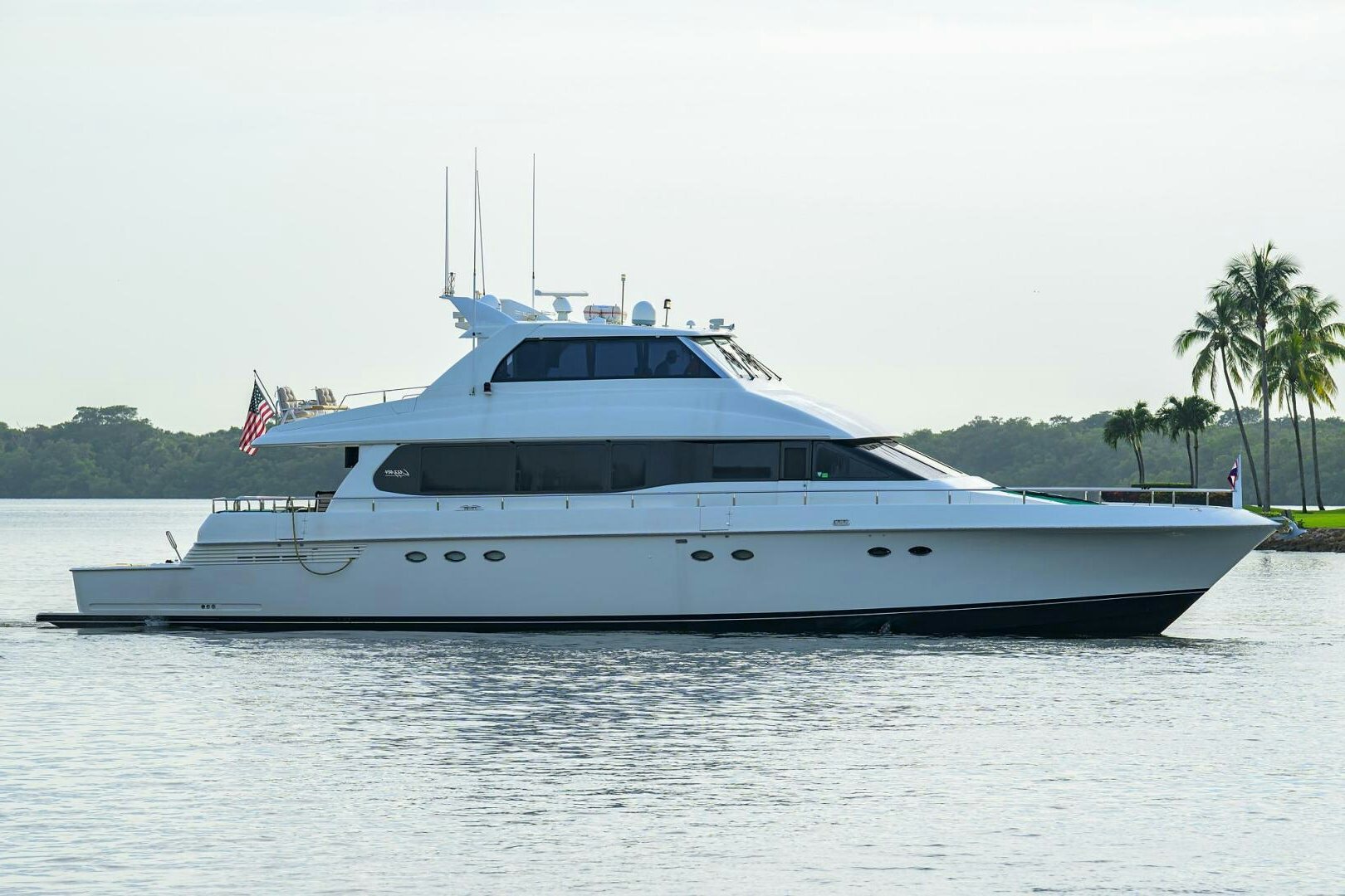a white boat on the water aboard LOST TEXAN Yacht for Sale
