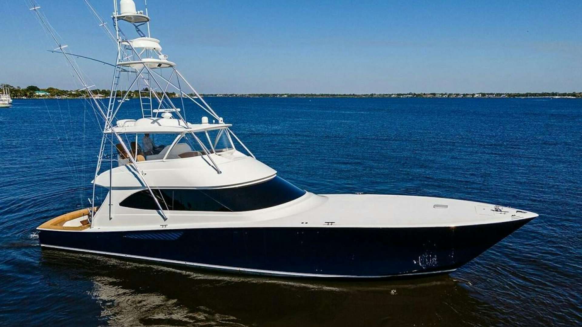 a boat on the water aboard LOW PROFILE Yacht for Sale