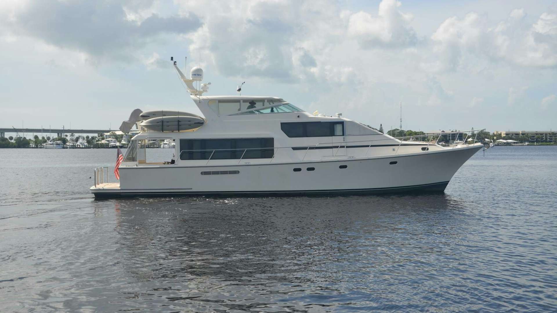 a white yacht in the water aboard ABRACADABRA Yacht for Sale