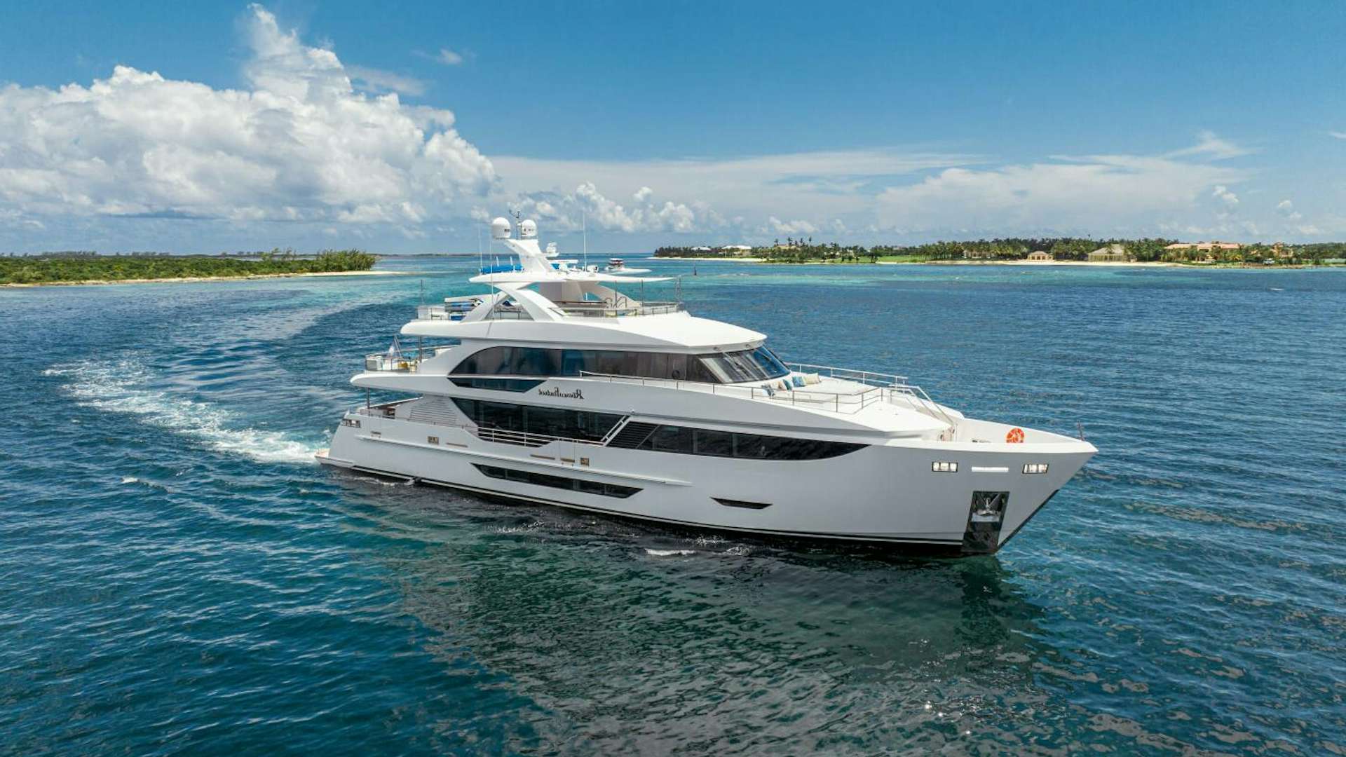 a white yacht in the water aboard ROMEO FOXTROT Yacht for Sale